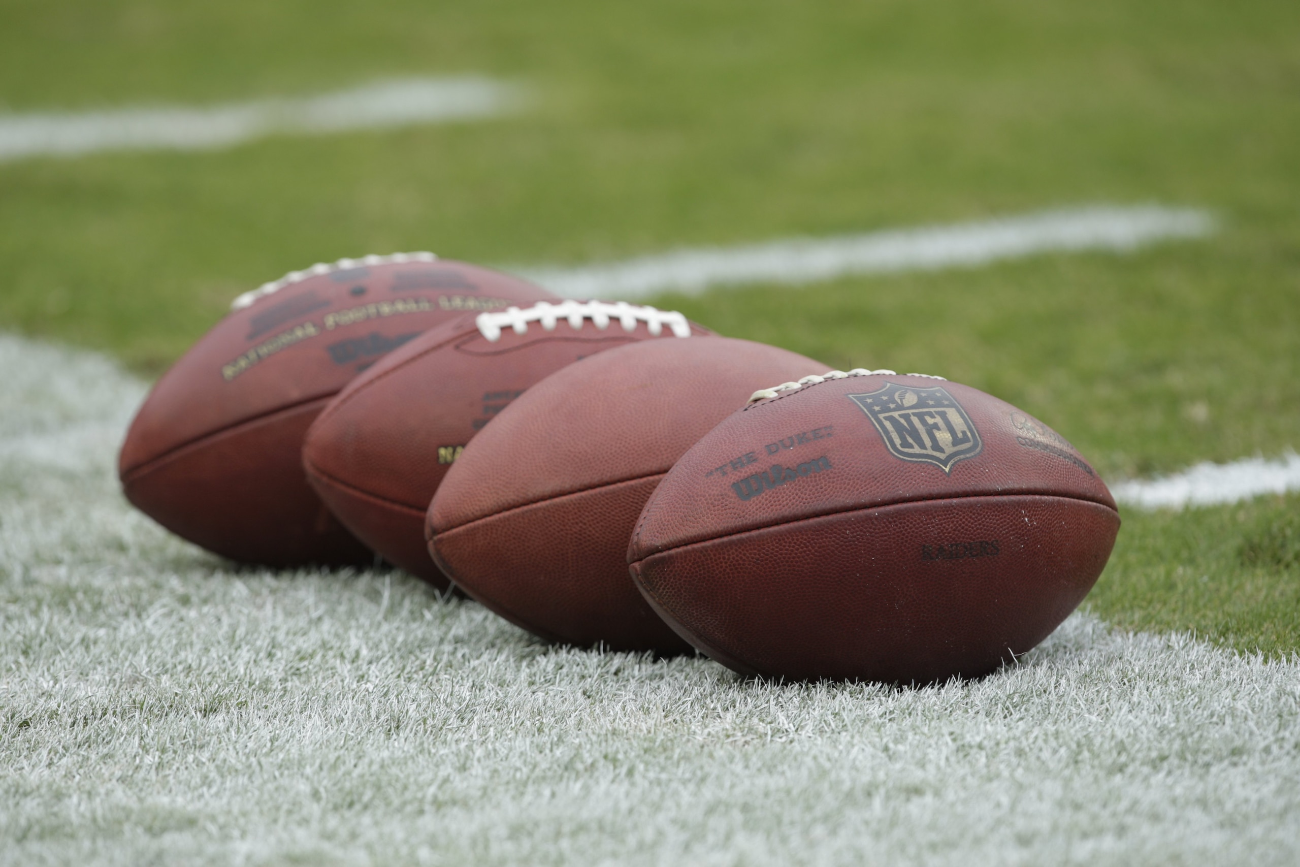 KANSAS CITY, MO - SEPTEMBER 20:  View of footballs on the field before the Oakland Raiders game against the Kansas City Chiefs at Arrowhead Stadium on September 20, 2009 in Kansas City, Missouri. (Photo by Jamie Squire/Getty Images)