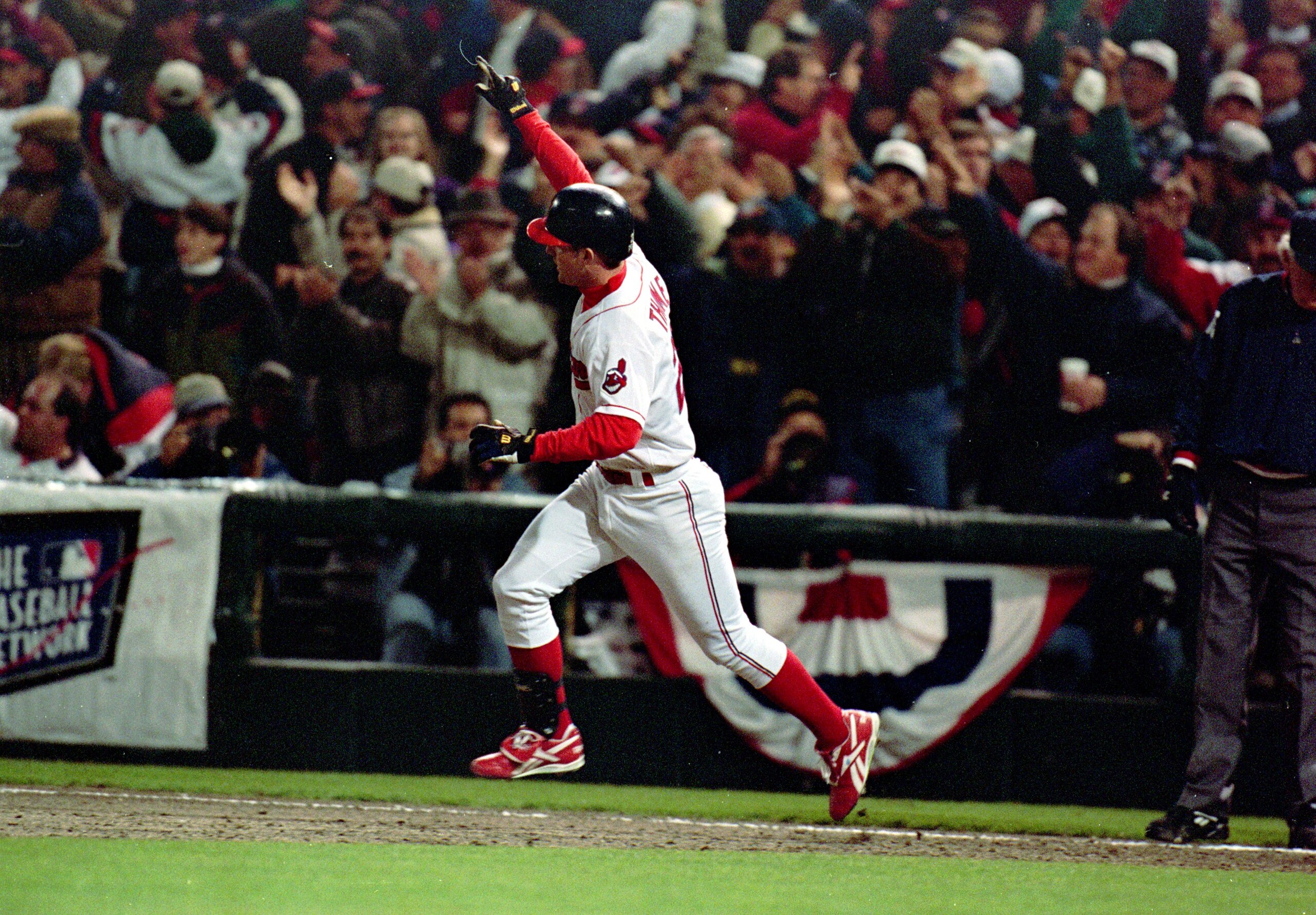 26 Oct 1995: Jim Thome of the Cleveland Indians celebrates his sixth inning home run during the game five of the World Series against the Atlanta Braves at the Jacobs Field in Cleveland, Ohio. The Indians defeated the Braves 5-4. Mandatory Credit: Al Bell