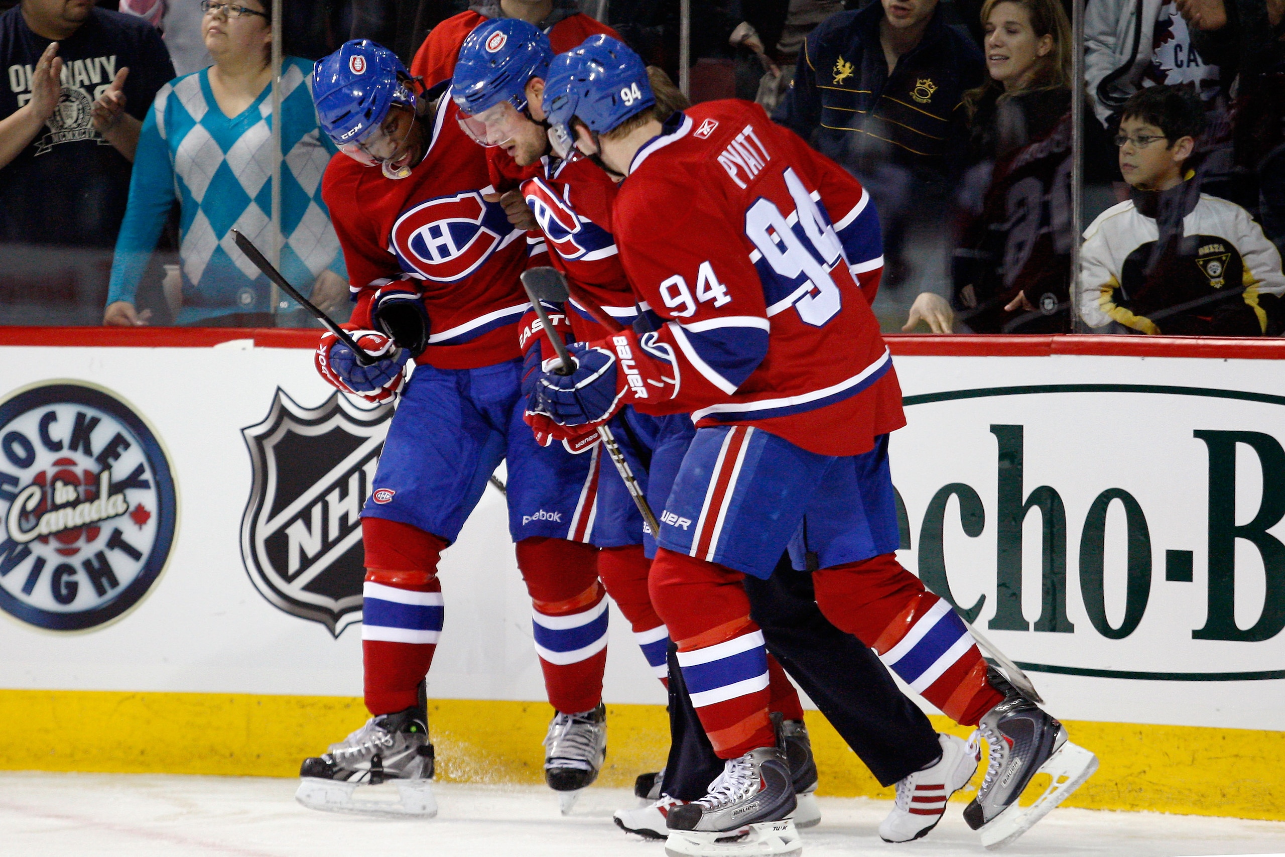 MONTREAL- NOVEMBER 13:  Andrei Markov #79 of the Montreal Canadiens is helped off the ice by teammates P.K. Subban #76 and Tom Pyatt #94 during the NHL game against the Carolina Hurricanes at the Bell Centre on November 13, 2010 in Montreal, Quebec, Canad