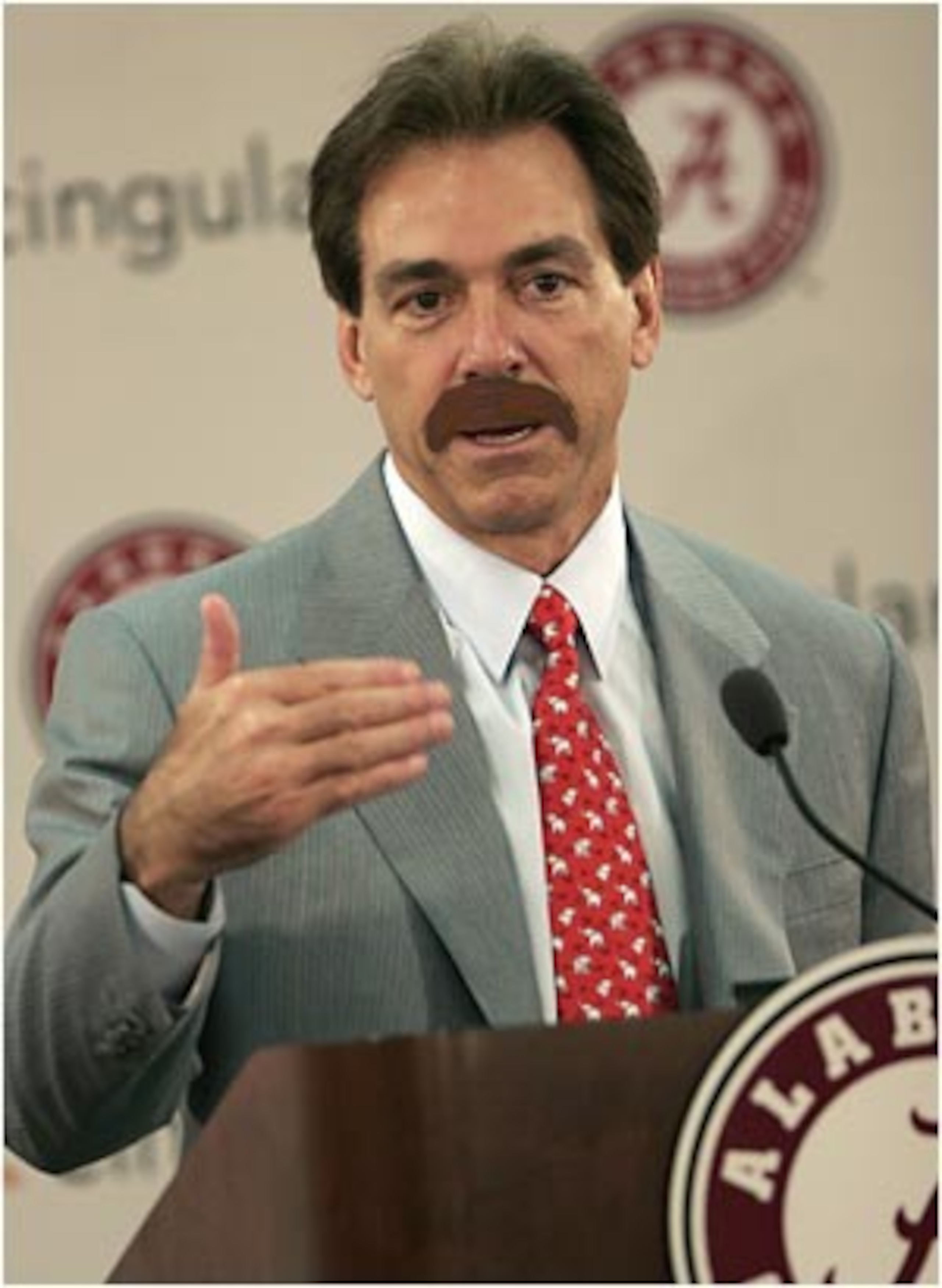 If Saban had that Earnhardt mustache you could see the resemblence better.