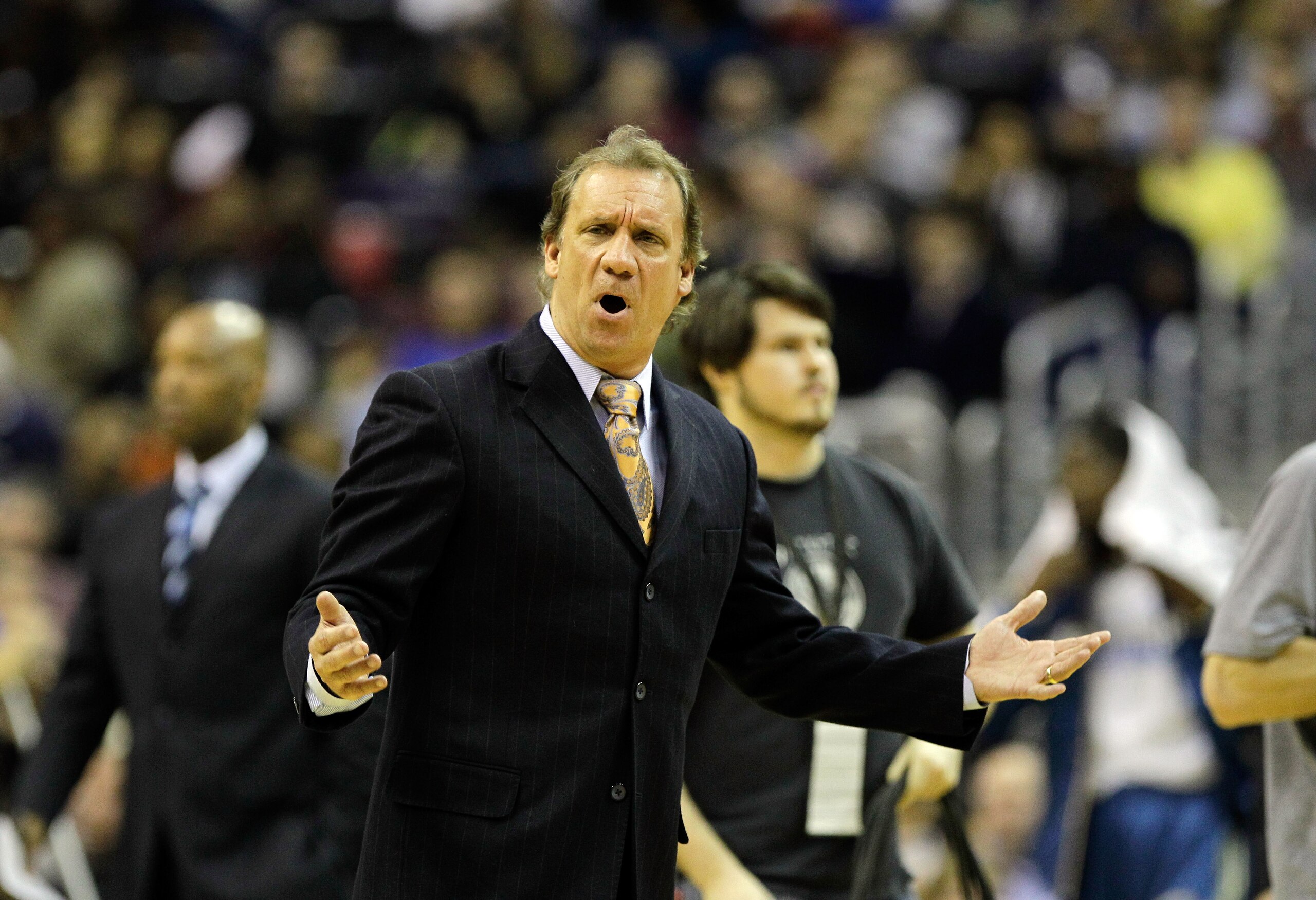 WASHINGTON, DC - FEBRUARY 26: Flip Saunders head coach of the Washington Wizards questions an officials call against the Dallas Mavericks at the Verizon Center on February 26, 2011 in Washington, DC. NOTE TO USER: User expressly acknowledges and agrees th