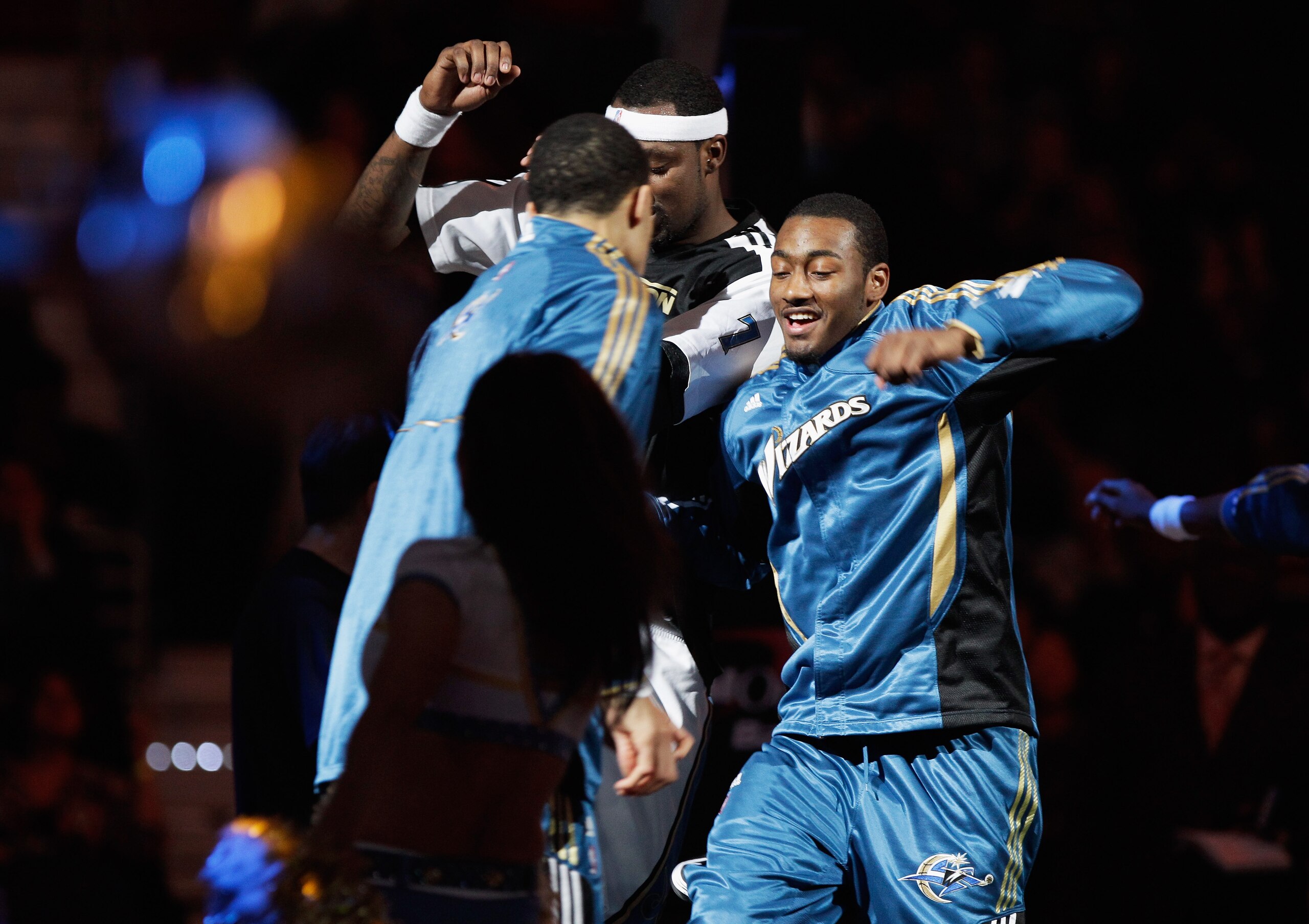 WASHINGTON, DC - FEBRUARY 28: John Wall #2 of the Washington Wizards (R) is introduced prior to the start of a basketball game against the Chicago Bulls  at the Verizon Center in Washington on February 28, 2011 in Washington, DC. NOTE TO USER: User expres
