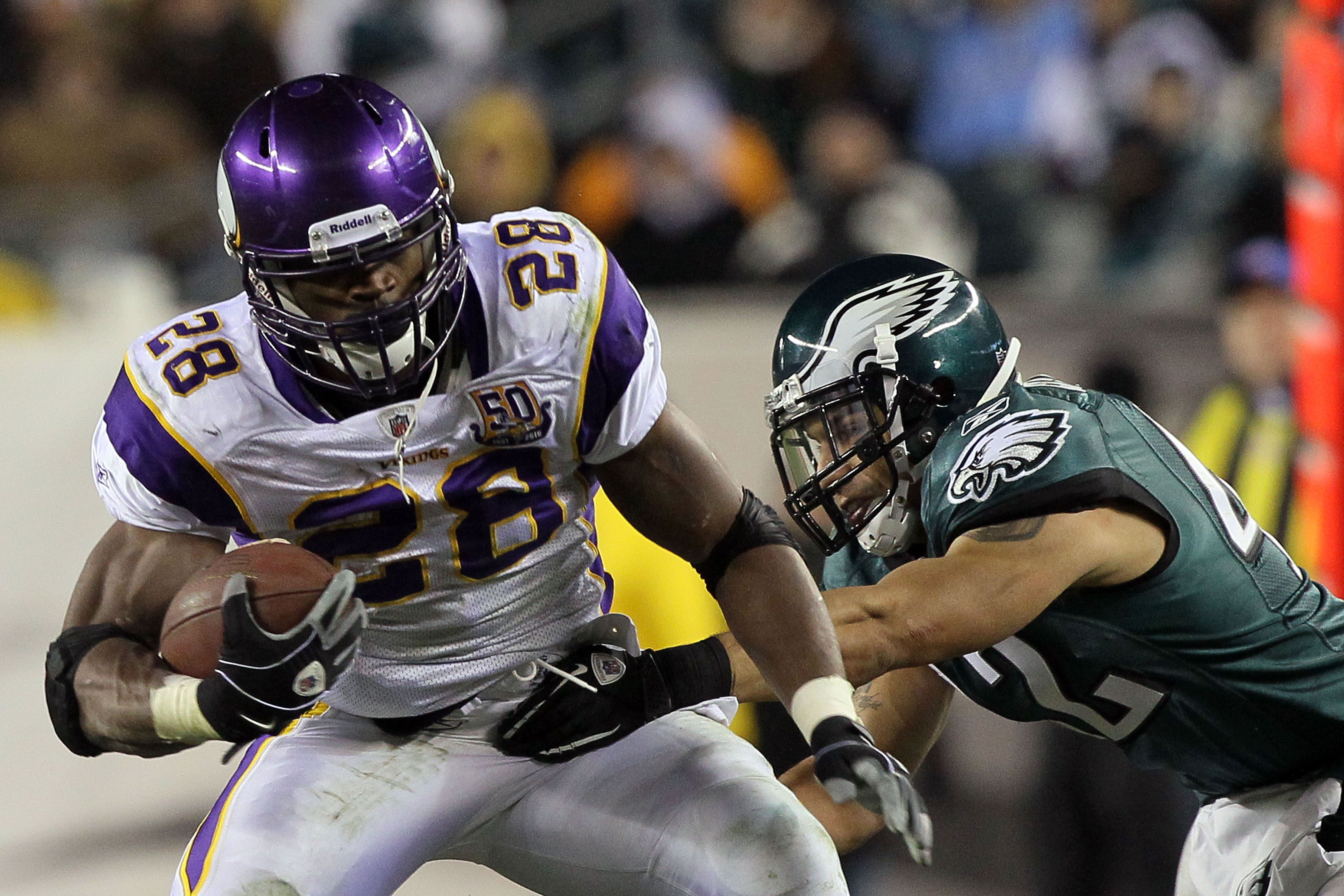 PHILADELPHIA, PA - DECEMBER 28:  Adrian Peterson #28 of the Minnesota Vikings runs against the Philadelphia Eagles at Lincoln Financial Field on December 26, 2010 in Philadelphia, Pennsylvania.  (Photo by Jim McIsaac/Getty Images)