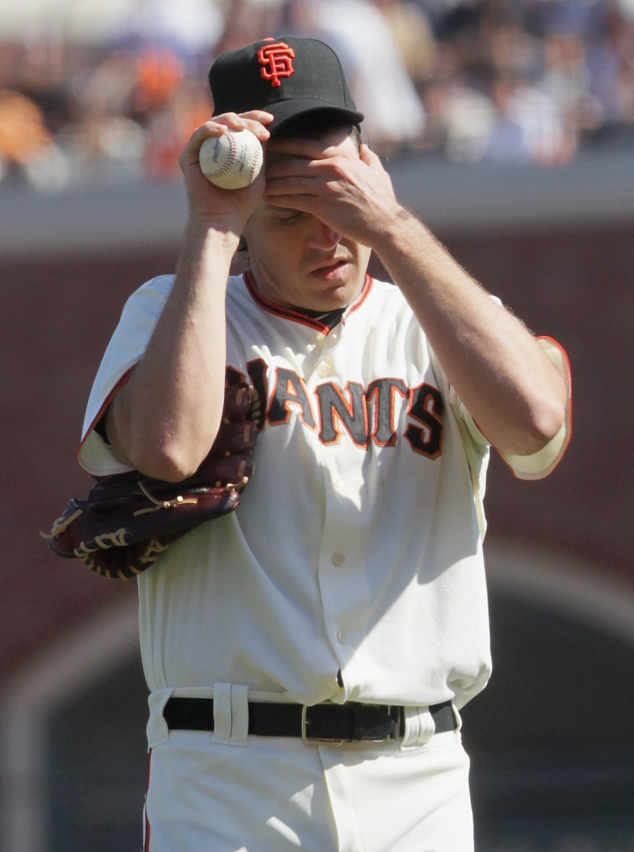 SAN FRANCISCO - OCTOBER 02:  Barry Zito #75 of the San Francisco Giants wipes his head during the third inning against the San Diego Padres at AT&T Park on October 2, 2010 in San Francisco, California.  (Photo by Justin Sullivan/Getty Images)