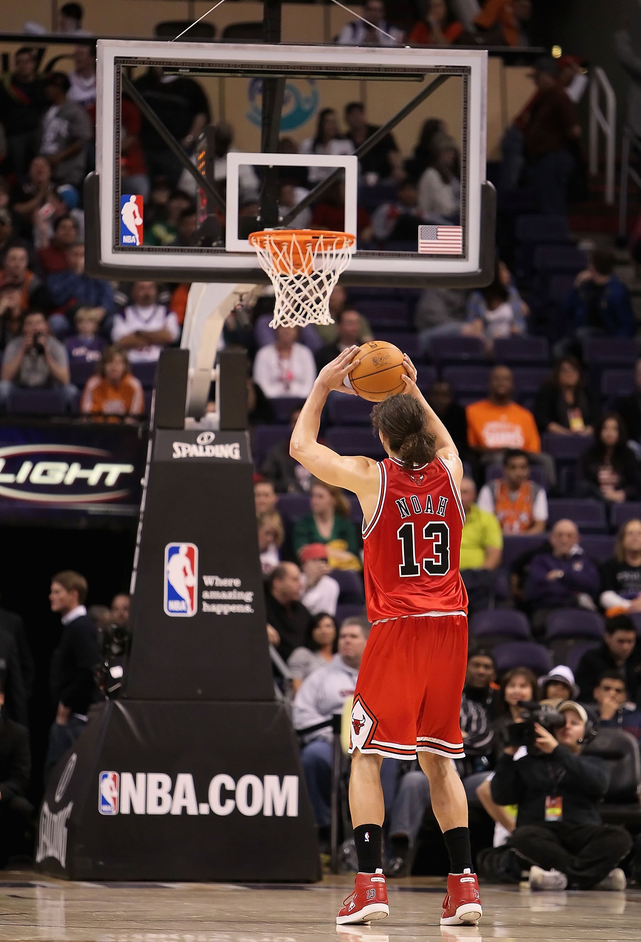 PHOENIX - JANUARY 22:  Joakim Noah #13 of the Chicago Bulls shoots a free throw shot during the NBA game against the Phoenix Suns at US Airways Center on January 22, 2010 in Phoenix, Arizona. The Bulls defeated the Suns 115-104.  NOTE TO USER: User expres