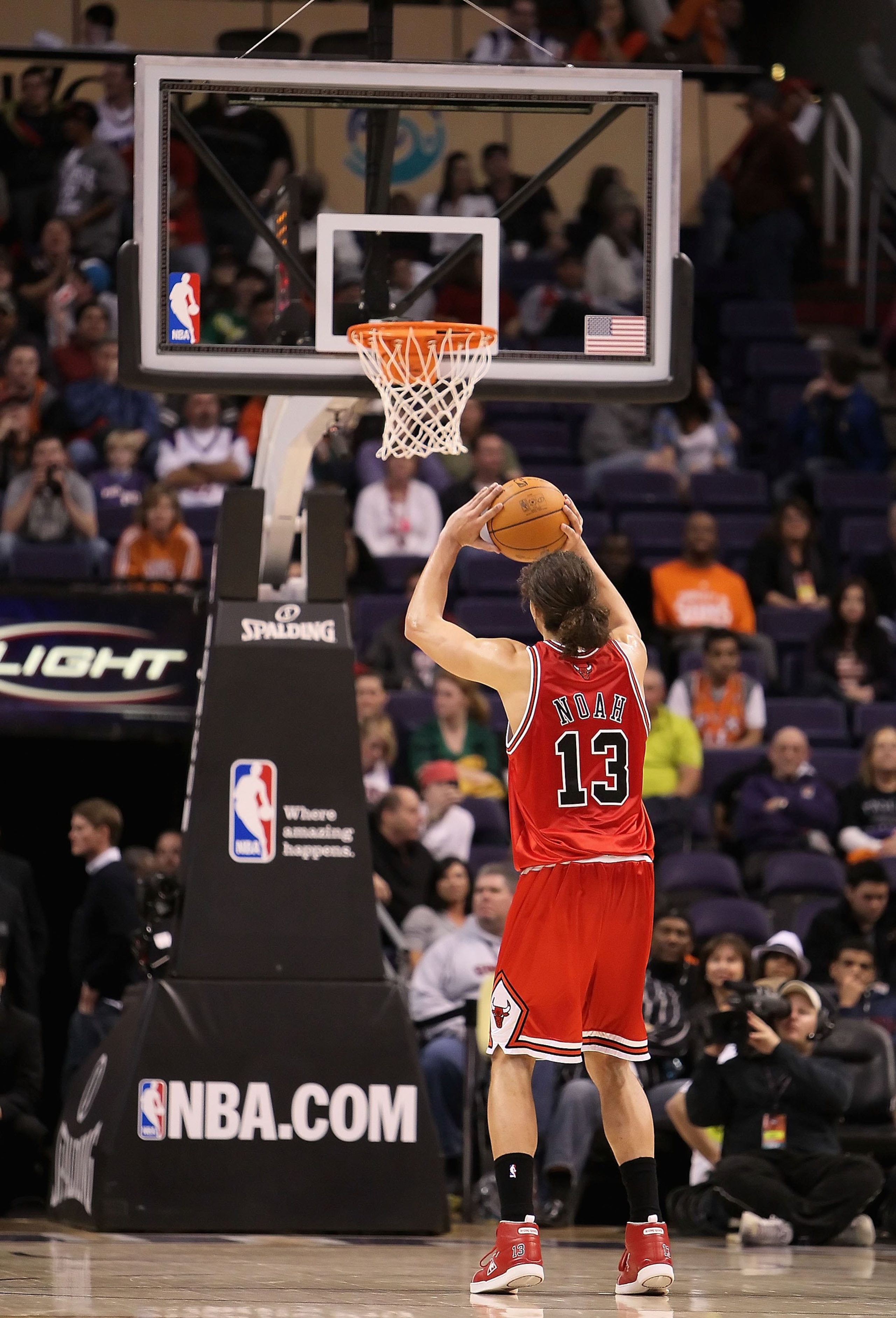 PHOENIX - JANUARY 22:  Joakim Noah #13 of the Chicago Bulls shoots a free throw shot during the NBA game against the Phoenix Suns at US Airways Center on January 22, 2010 in Phoenix, Arizona. The Bulls defeated the Suns 115-104.  NOTE TO USER: User expres