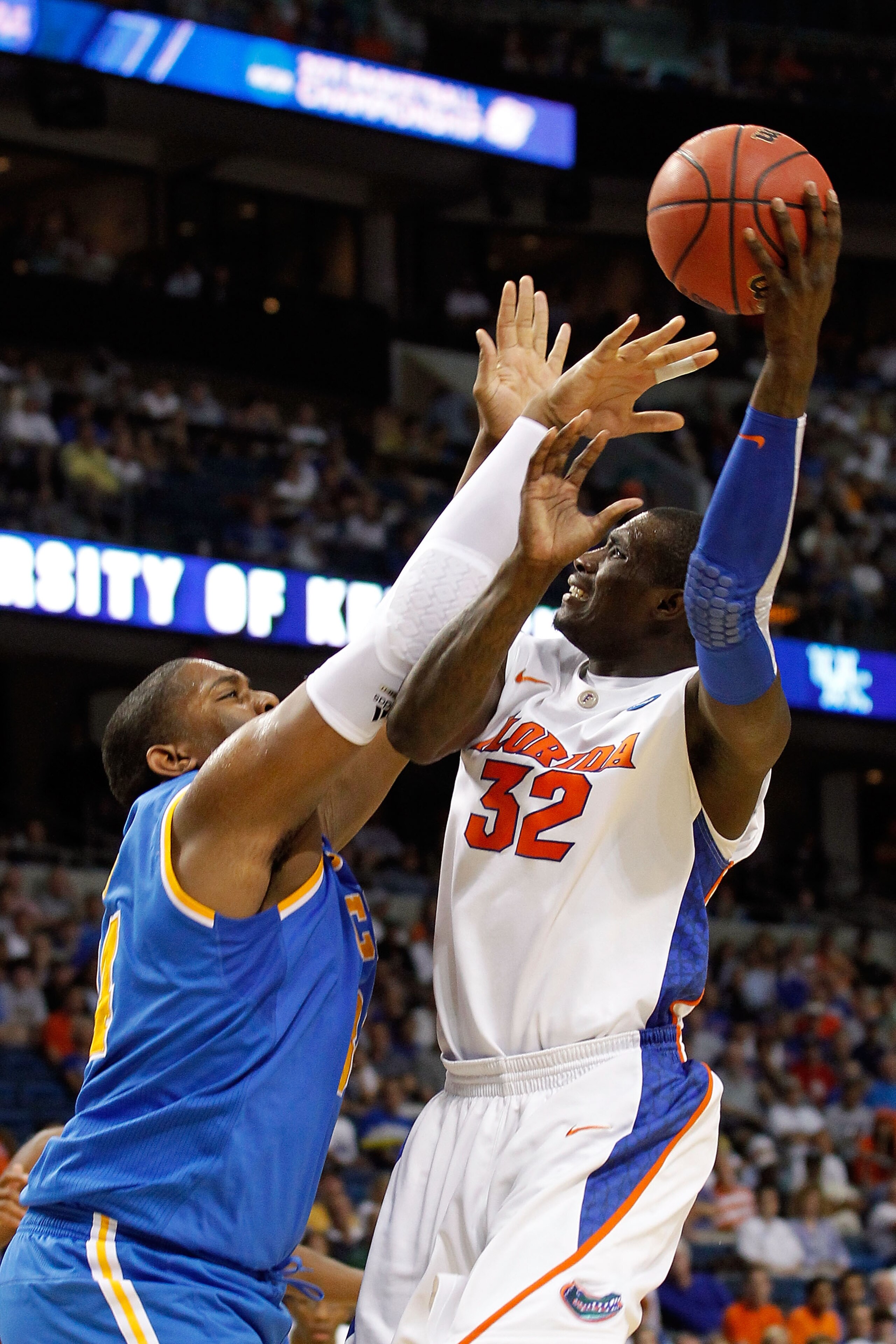 TAMPA, FL - MARCH 19:  Vernon Macklin #32 of the Florida Gators attempts a shot against Joshua Smith #34 of the UCLA Bruins during the third round of the 2011 NCAA men's basketball tournament at St. Pete Times Forum on March 19, 2011 in Tampa, Florida.  (
