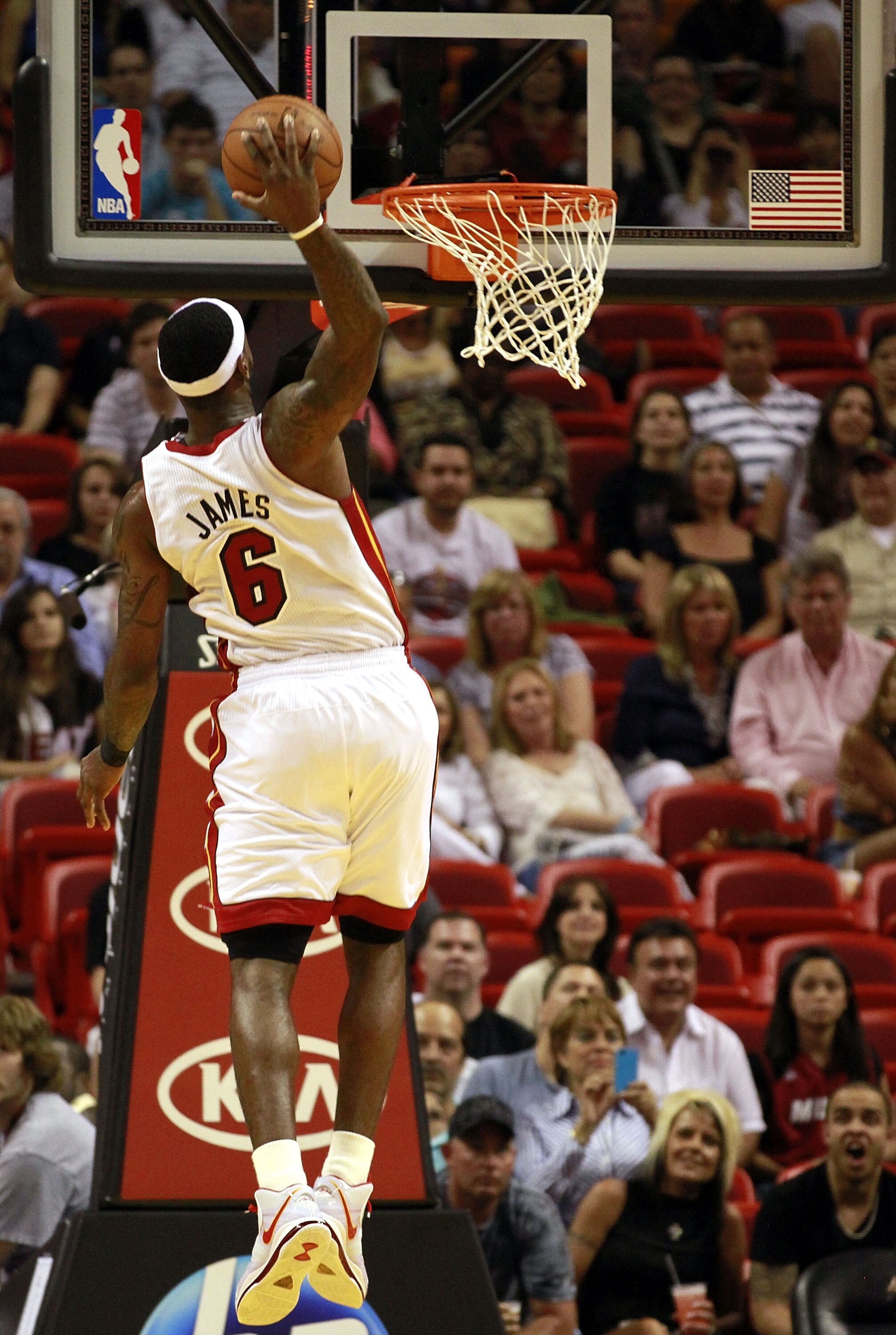 MIAMI, FL - MARCH 19: Forward LeBron James #6 of the Miami Heat dunks against the Denver Nuggets at American Airlines Arena on March 19, 2011 in Miami, Florida. The Heat defeated the Nuggets 103-98. NOTE TO USER: User expressly acknowledges and agrees th MIAMI, FL - MARCH 19: Forward LeBron James #6 of the Miami Heat dunks against the Denver Nuggets at American Airlines Arena on March 19, 2011 in Miami, Florida. The Heat defeated the Nuggets 103-98. NOTE TO USER: User expressly acknowledges and agrees th