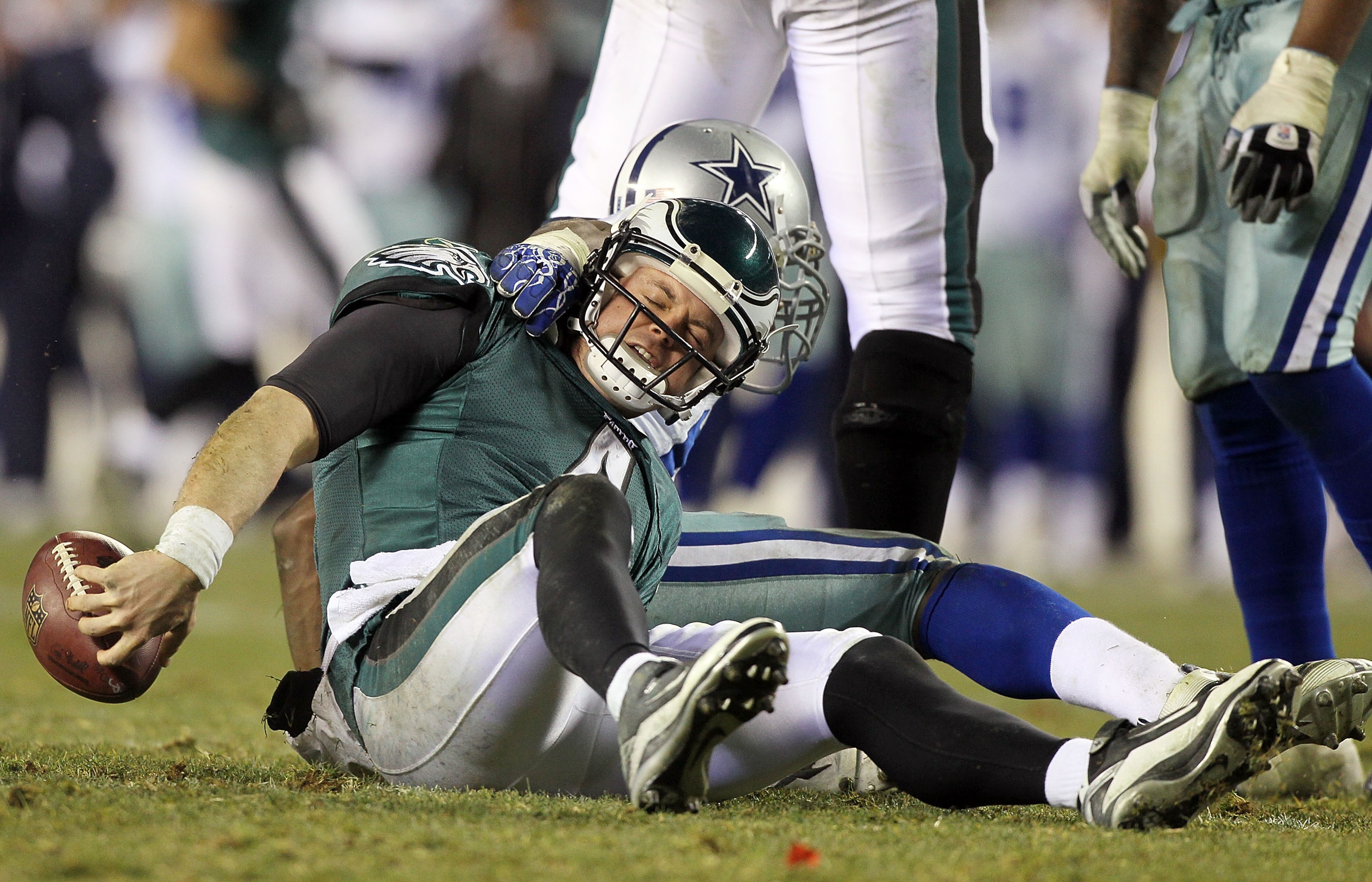 PHILADELPHIA, PA - JANUARY 02: Kevin Kolb #4 of the Philadelphia Eagles is sacked by DeMarcus Ware #94 of the Dallas Cowboys on January 2, 2011 at Lincoln Financial Field in Philadelphia, Pennsylvania. The Cowboys defeated the Eagles 14-13. (Photo by Ji PHILADELPHIA, PA - JANUARY 02: Kevin Kolb #4 of the Philadelphia Eagles is sacked by DeMarcus Ware #94 of the Dallas Cowboys on January 2, 2011 at Lincoln Financial Field in Philadelphia, Pennsylvania. The Cowboys defeated the Eagles 14-13. (Photo by Ji