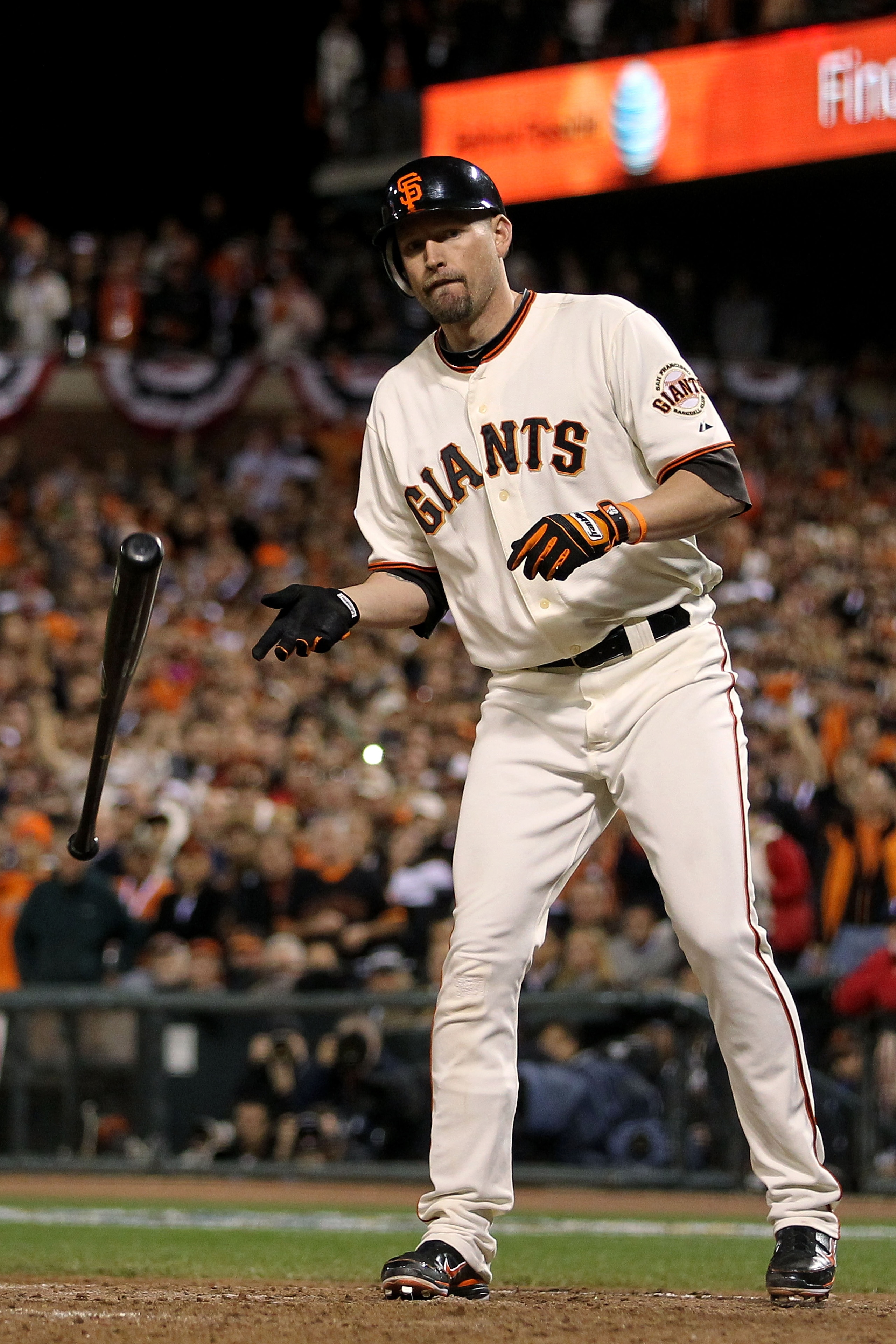 SAN FRANCISCO - OCTOBER 28:  Aubrey Huff #17 of the San Francisco Giants walks with the bases loaded to score Buster Posey #28 in the eighth inning while taking on the Texas Rangers in Game Two of the 2010 MLB World Series at AT&T Park on October 28, 2010