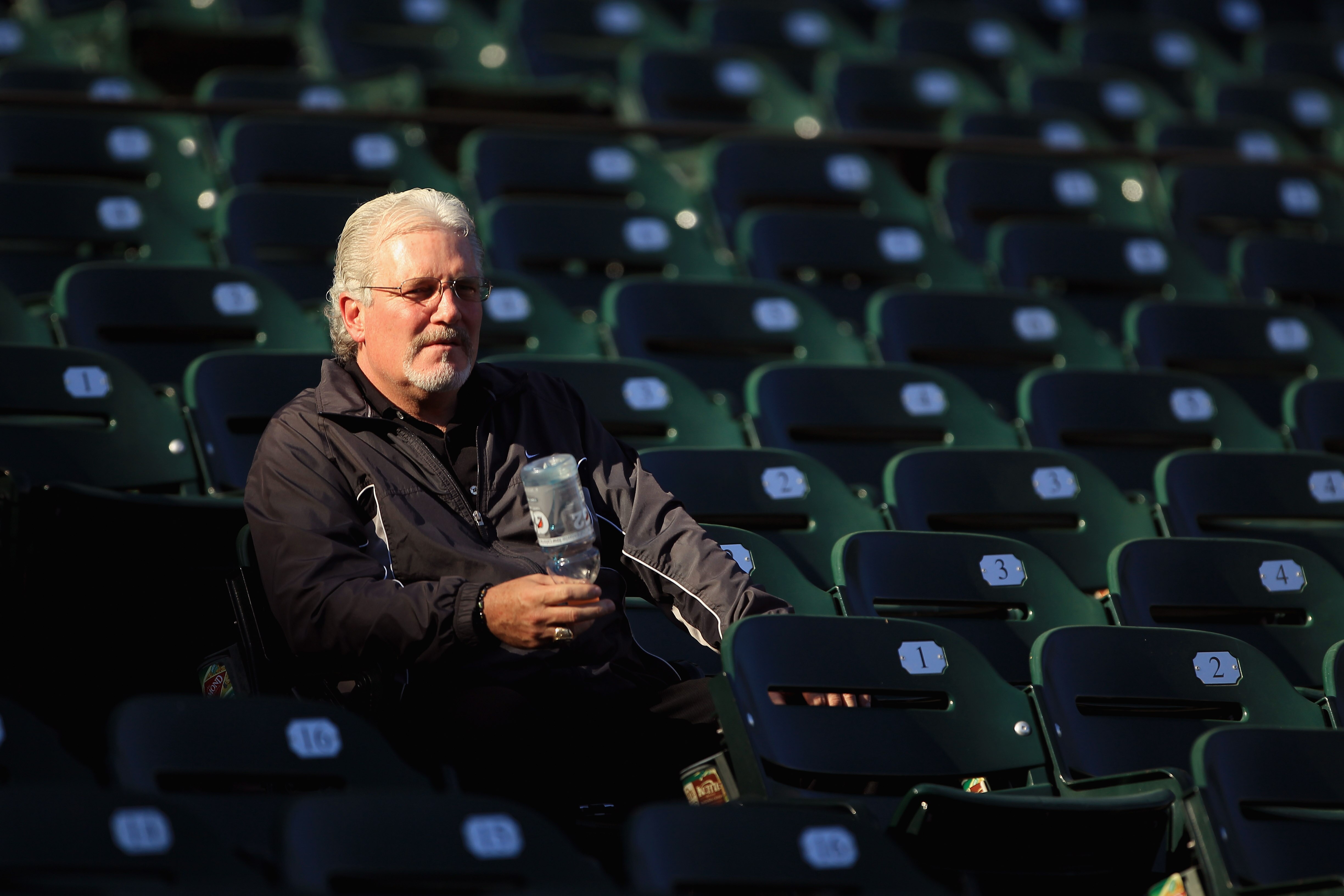 SAN FRANCISCO - OCTOBER 13:  San Francisco Giants general manager Brian Sabean sits in the stands during a workout session in preparation for the National League Championship Series at AT&T Park on October 13, 2010 in San Francisco, California.  (Photo by