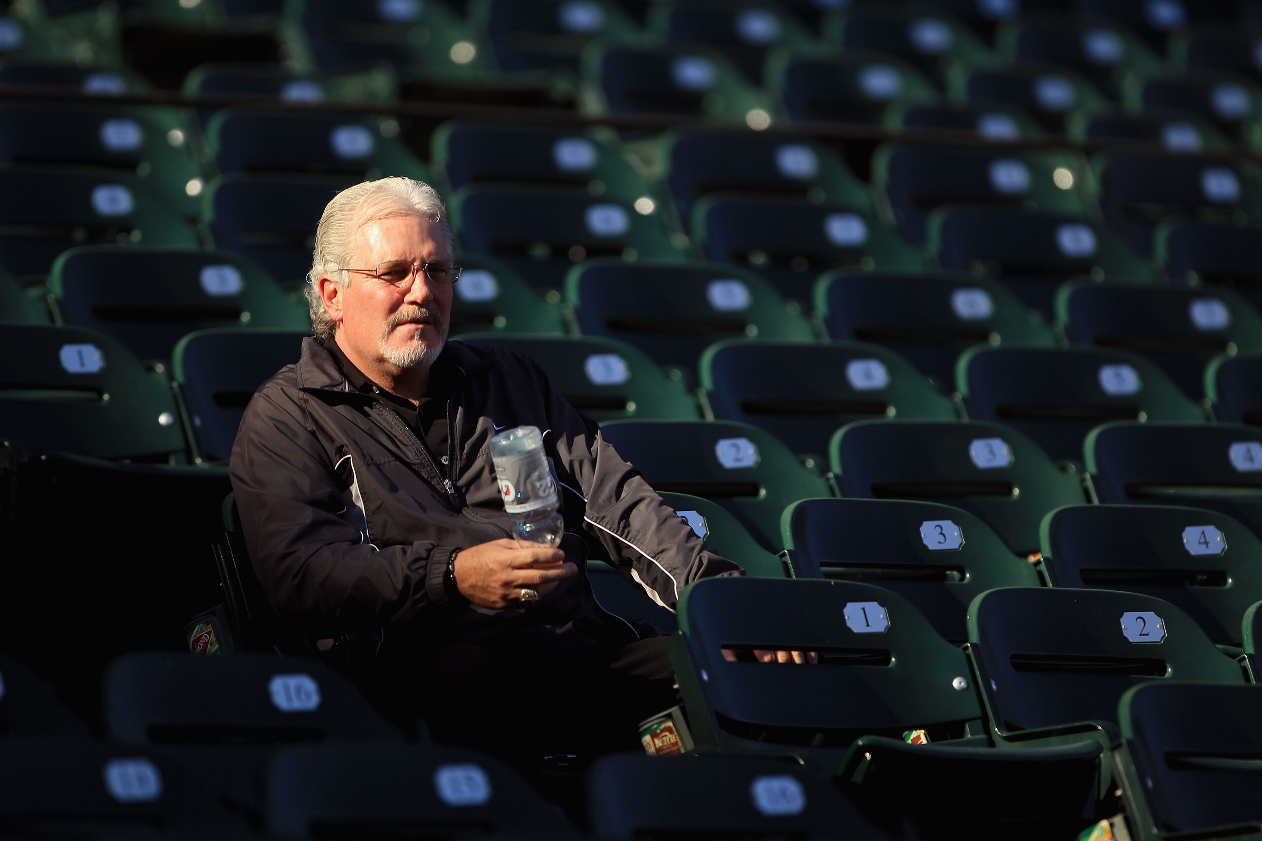 SAN FRANCISCO - OCTOBER 13:  San Francisco Giants general manager Brian Sabean sits in the stands during a workout session in preparation for the National League Championship Series at AT&T Park on October 13, 2010 in San Francisco, California.  (Photo by