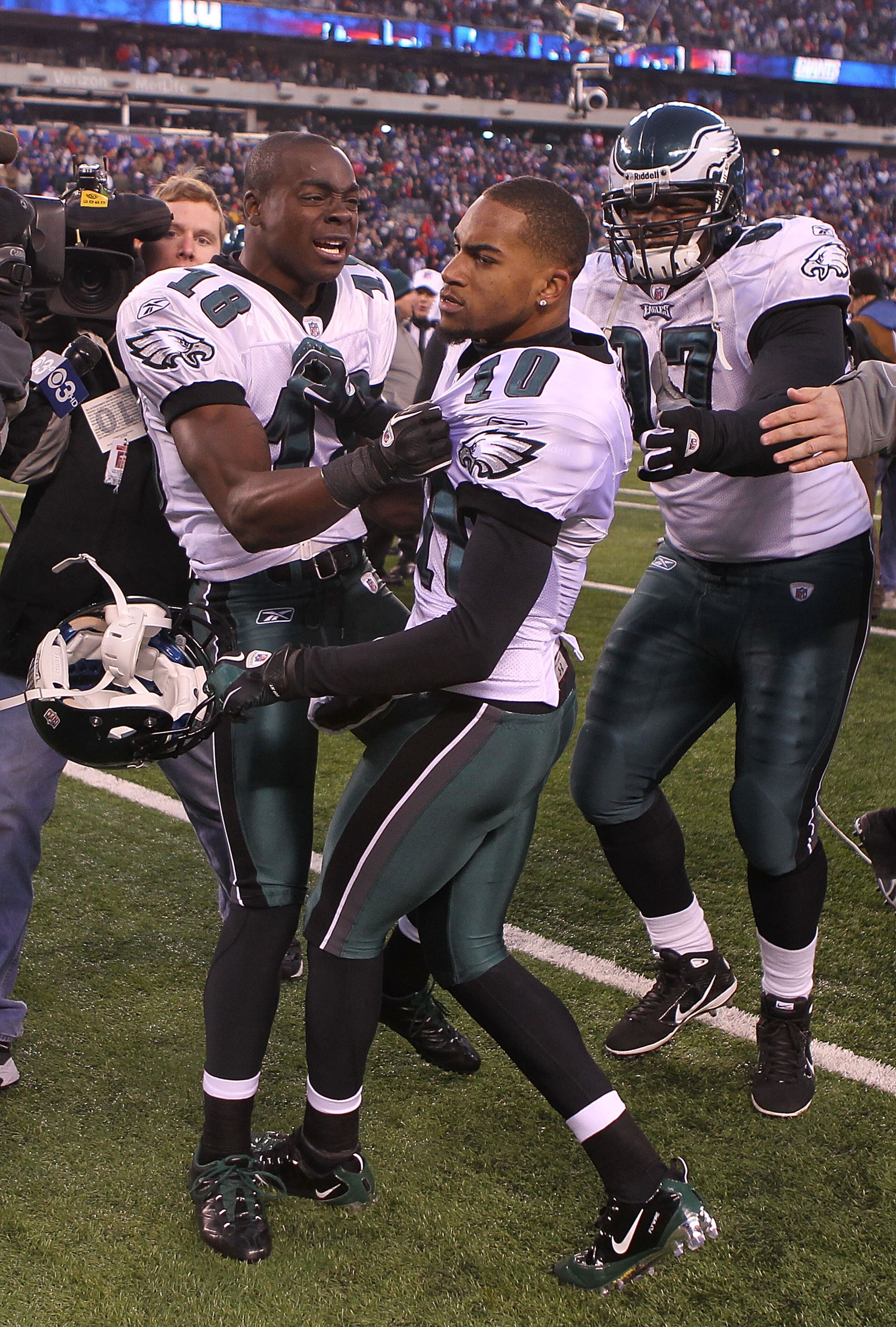 EAST RUTHERFORD, NJ - DECEMBER 19: DeSean Jackson #10 of the Philadelphia Eagles celebrates his game winning touchdown with teammates Jeremy Maclin #18 and Brodrick Bunkley #97 against the New York Giants at New Meadowlands Stadium on December 19, 2010 in