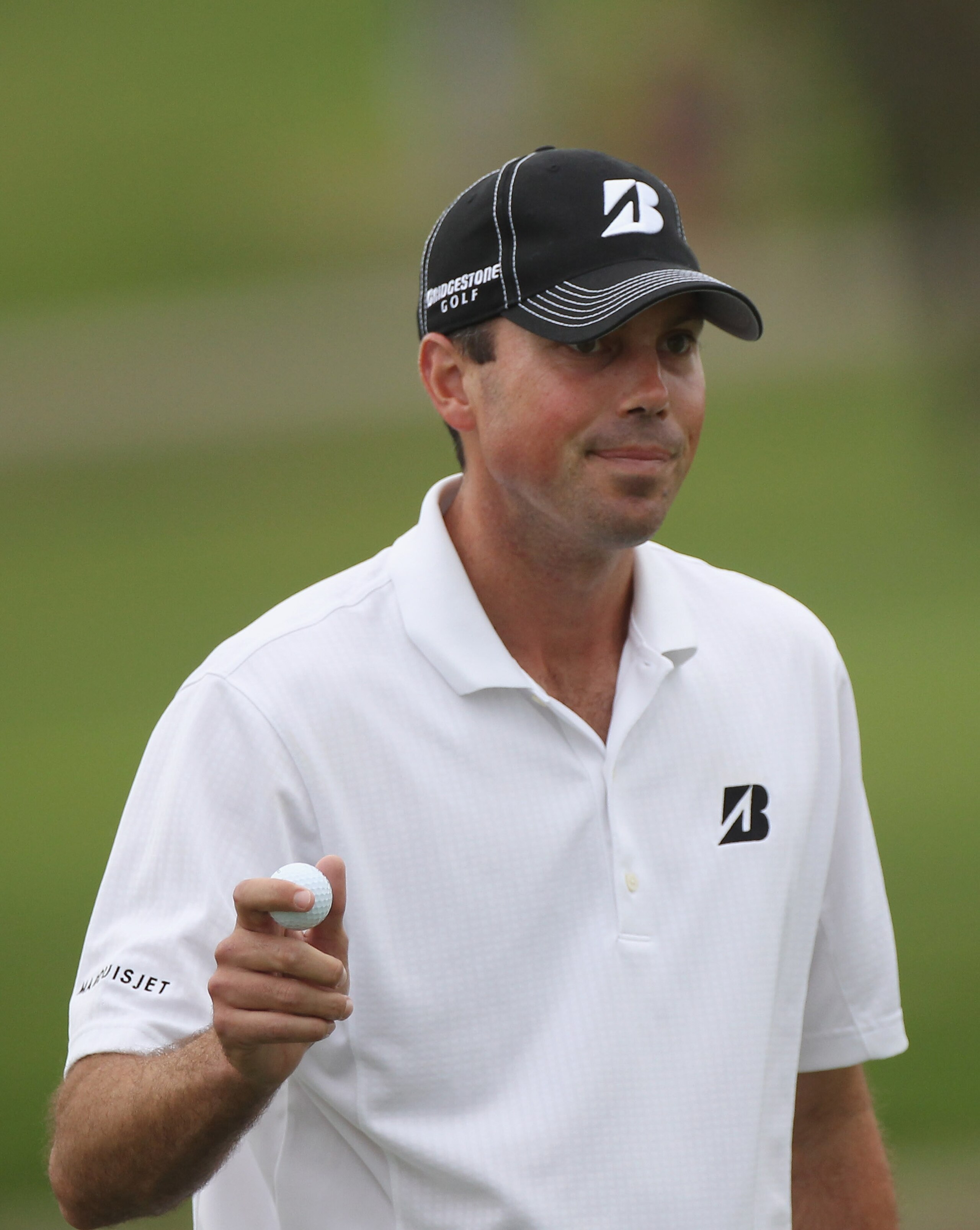 DORAL, FL - MARCH 10:  Matt Kuchar waves to the gallery on the eighth hole during the first round of the 2011 WGC- Cadillac Championship at the TPC Blue Monster at the Doral Golf Resort and Spa on March 10, 2011 in Doral, Florida.  (Photo by Sam Greenwood
