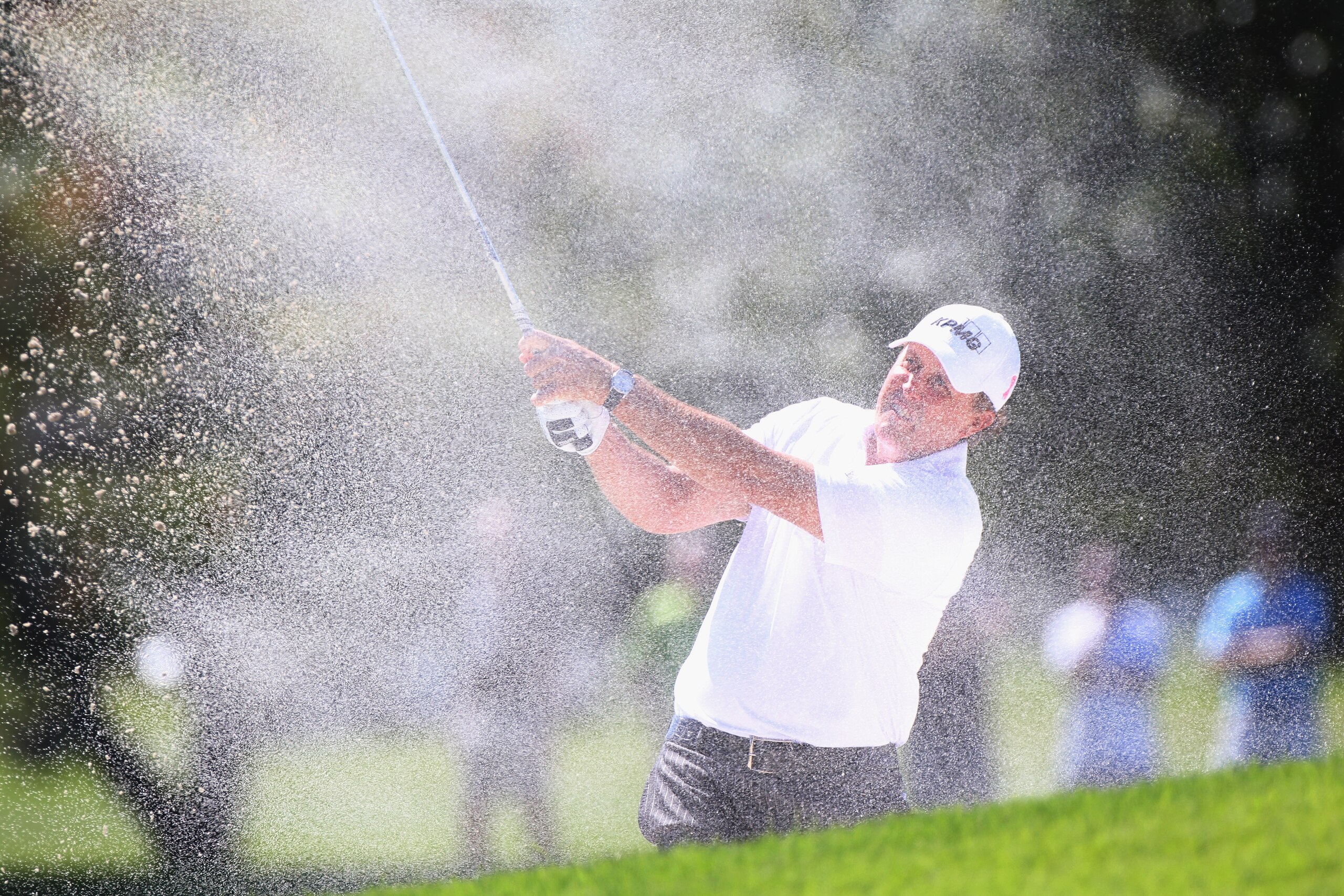 DORAL, FL - MARCH 12:  Phil Mickelson hits a shot during the third round of the 2011 WGC- Cadillac Championship at the TPC Blue Monster at the Doral Golf Resort and Spa on March 12, 2011 in Doral, Florida.  (Photo by Sam Greenwood/Getty Images)