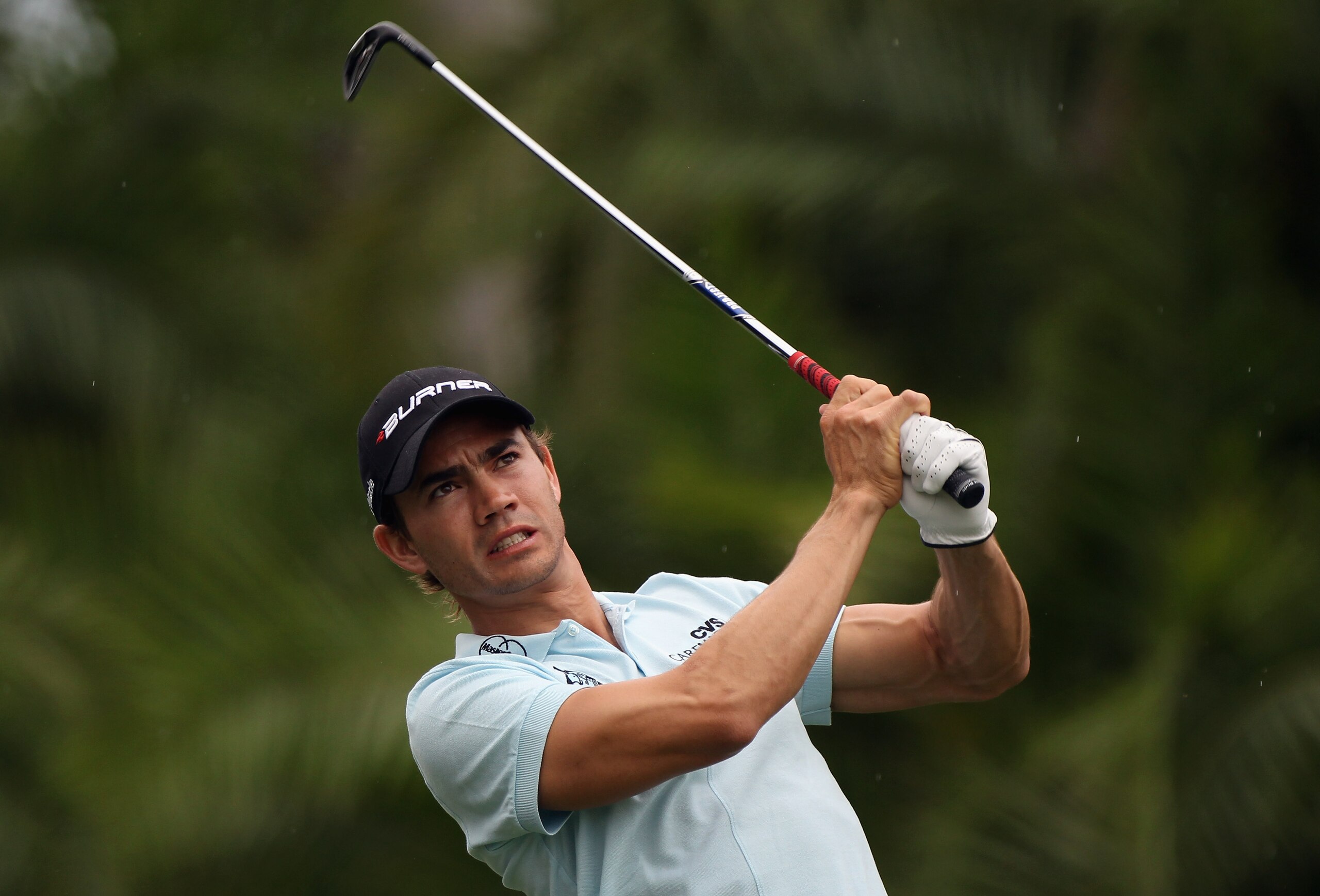 DORAL, FL - MARCH 10:  Camilo Villegas of Colombia watches his tee shot on the 13th hole during the first round of the 2011 WGC- Cadillac Championship at the TPC Blue Monster at the Doral Golf Resort and Spa on March 10, 2011 in Doral, Florida.  (Photo by