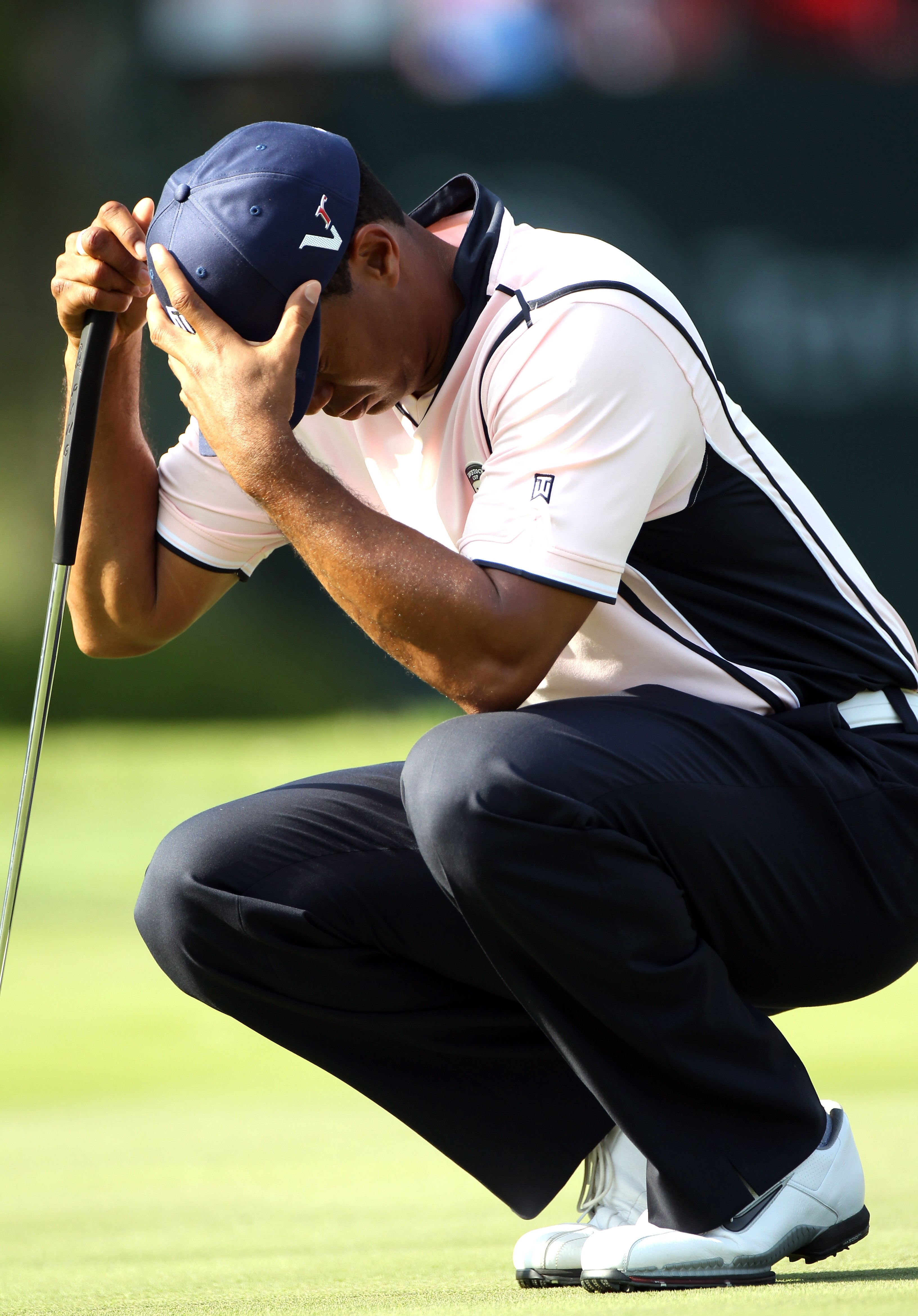 WINDERMERE, FL - MARCH 15:  Tiger Woods waits to play a shot on the 18th hole during the second day of the Tavistock Cup at Isleworth Golf & Country Club on March 15, 2011 in Windermere, Florida.  (Photo by Sam Greenwood/Getty Images)