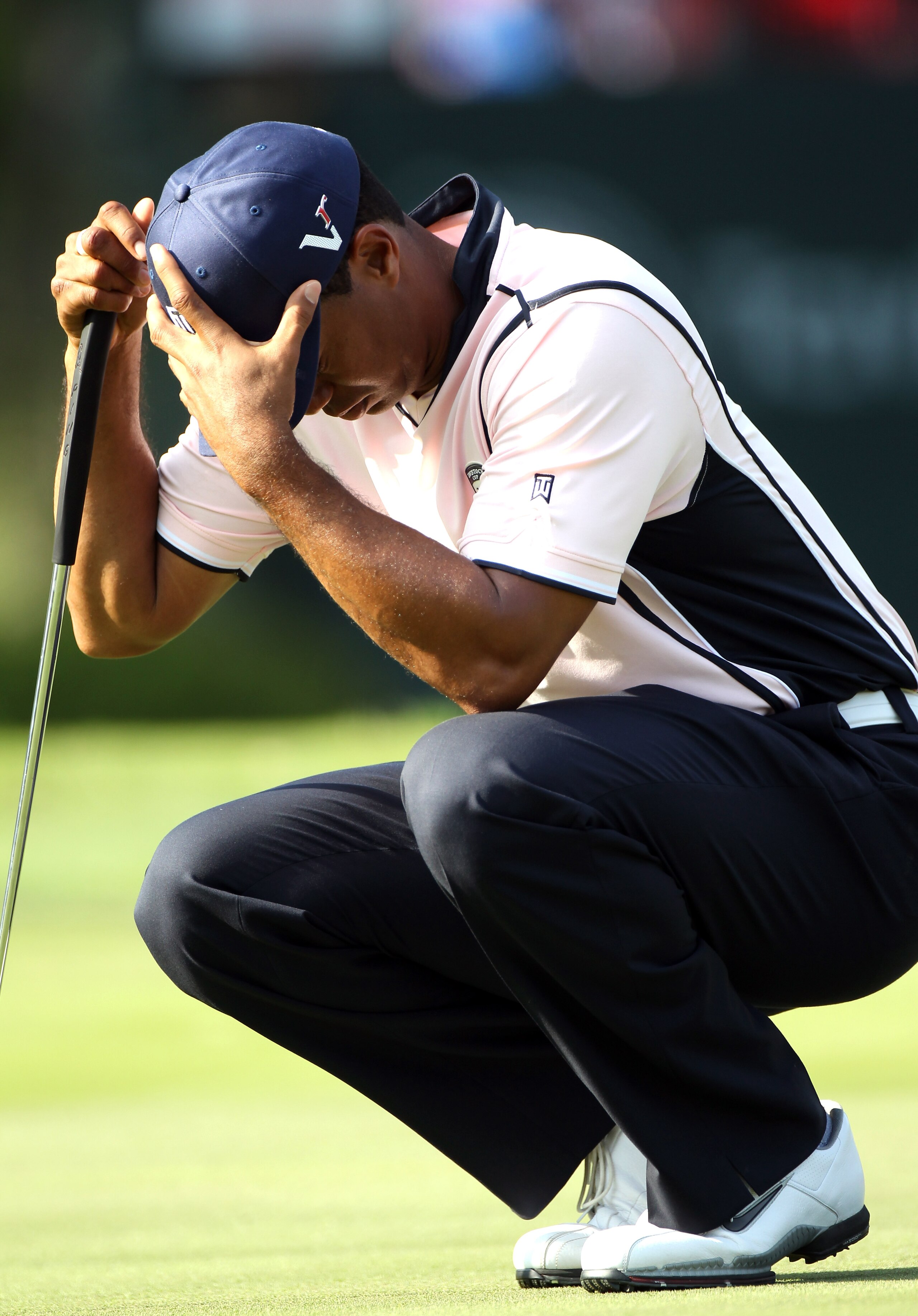 WINDERMERE, FL - MARCH 15:  Tiger Woods waits to play a shot on the 18th hole during the second day of the Tavistock Cup at Isleworth Golf & Country Club on March 15, 2011 in Windermere, Florida.  (Photo by Sam Greenwood/Getty Images)