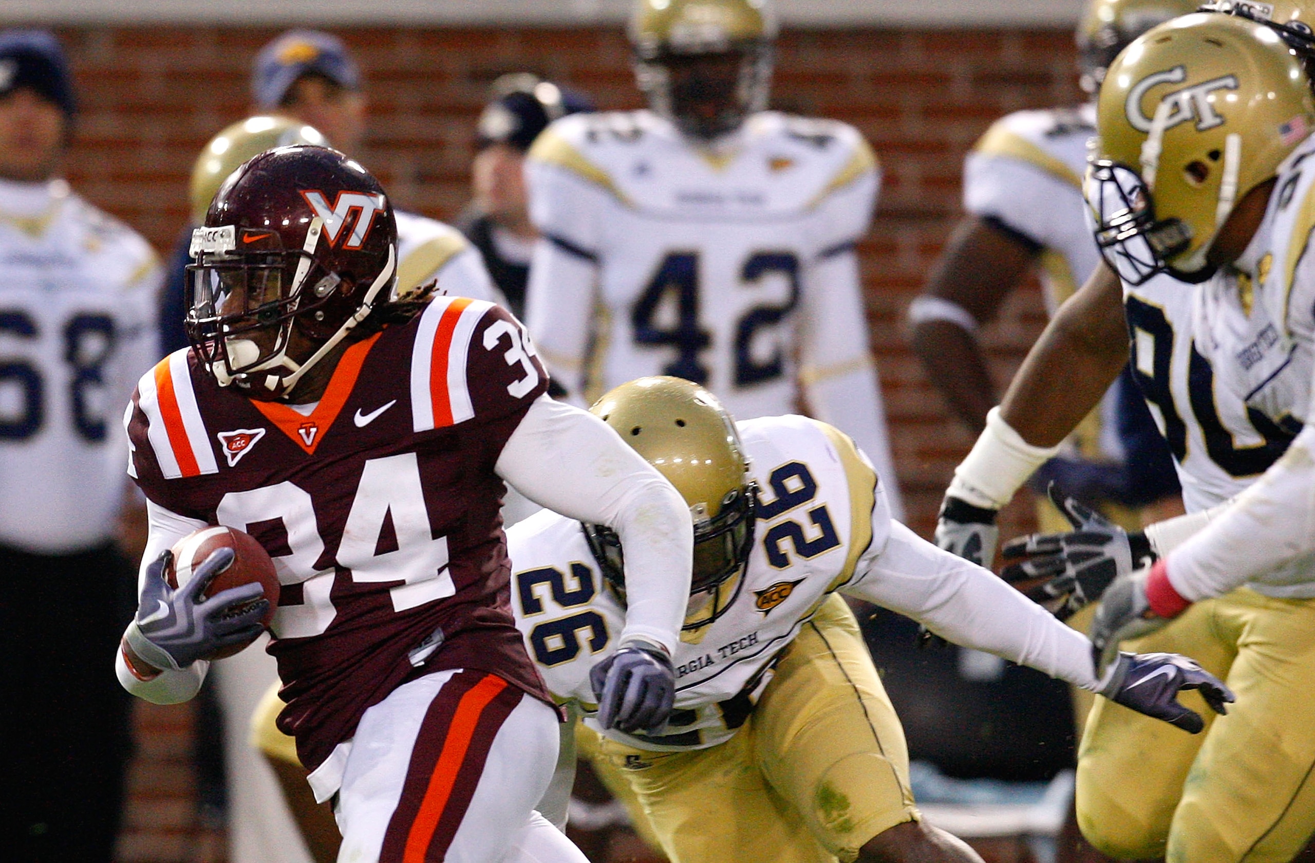 ATLANTA - OCTOBER 17:  Ryan Williams #34 of the Virginia Tech Hokies rushes upfield past a number of defenders of the Georgia Tech Yellow Jackets at Bobby Dodd Stadium on October 17, 2009 in Atlanta, Georgia.  (Photo by Kevin C. Cox/Getty Images)