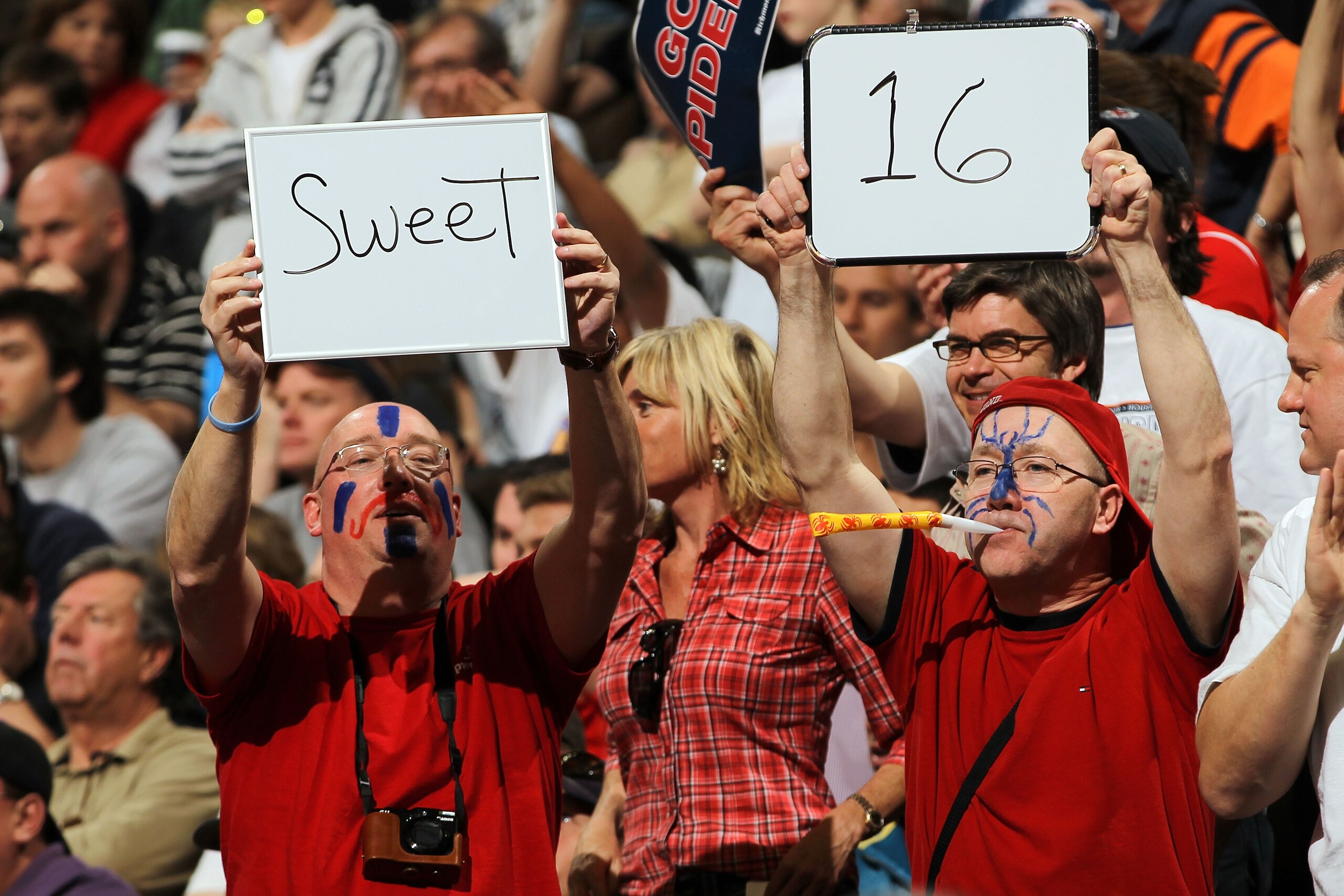 DENVER, CO - MARCH 19:  Fans of the Richmond Spiders hold up a sign reading 'Sweet 16' during the third round of the 2011 NCAA men's basketball tournament at Pepsi Center on March 19, 2011 in Denver, Colorado.  (Photo by Doug Pensinger/Getty Images)