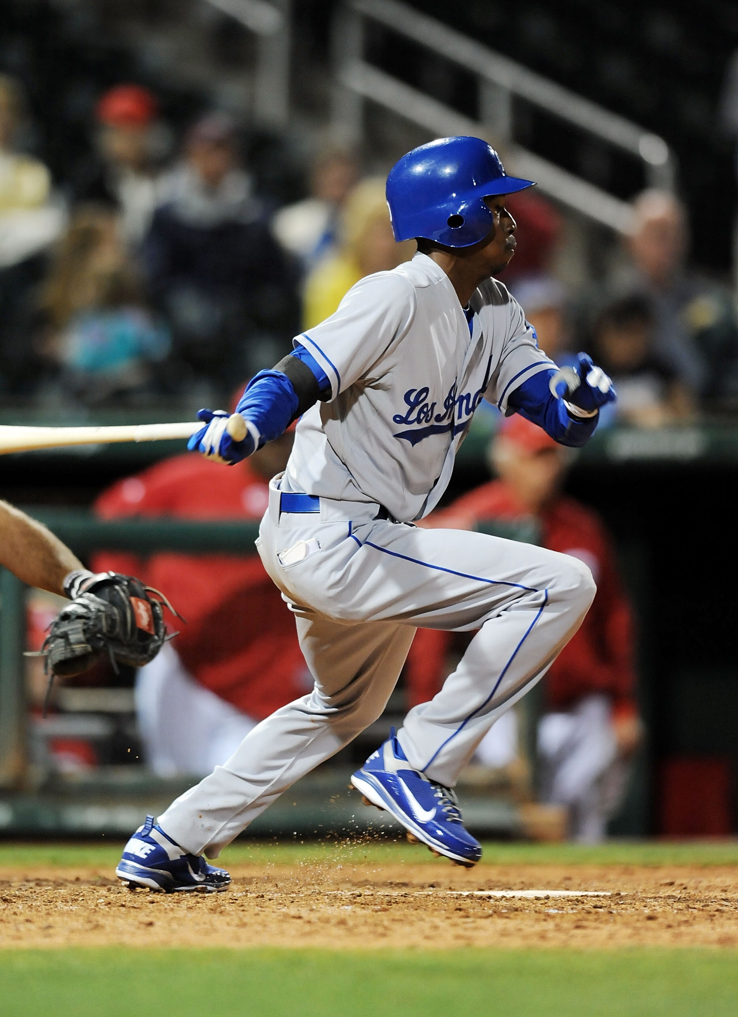GOODYEAR, AZ - MARCH 03:  Dee Gordon #70 of the Los Angeles Dodgers follows through on a swing against the Cincinnati Reds at Goodyear Ballpark on March 3, 2011 in Goodyear, Arizona.  (Photo by Norm Hall/Getty Images)