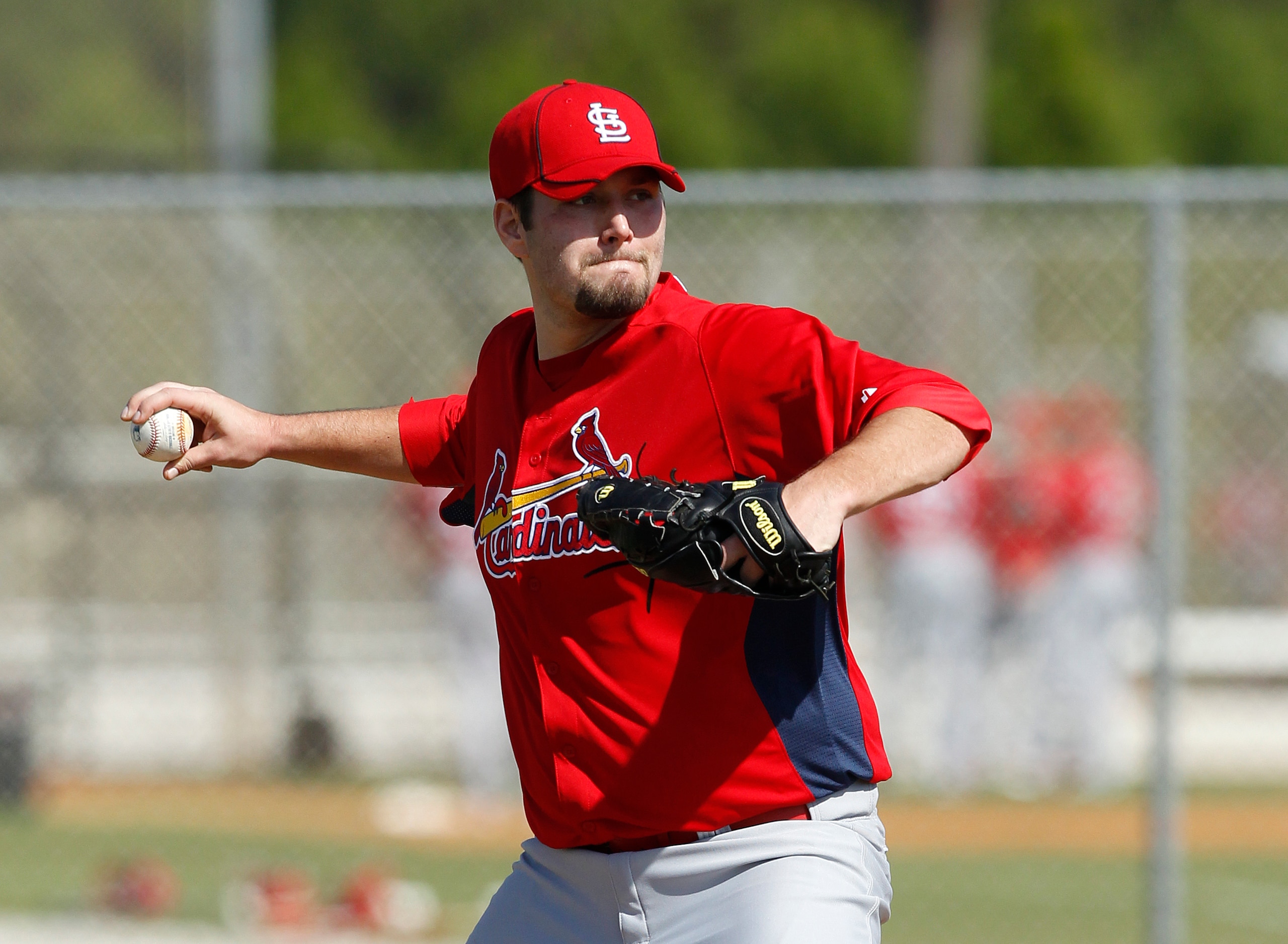 JUPITER, FL - FEBRUARY 17: Lance Lynn #70 of the St. Louis Cardinals practices pick off attempts at Roger Dean Stadium on February 17, 2011 in Jupiter, Florida. (Photo by Joel Auerbach/Getty Images)