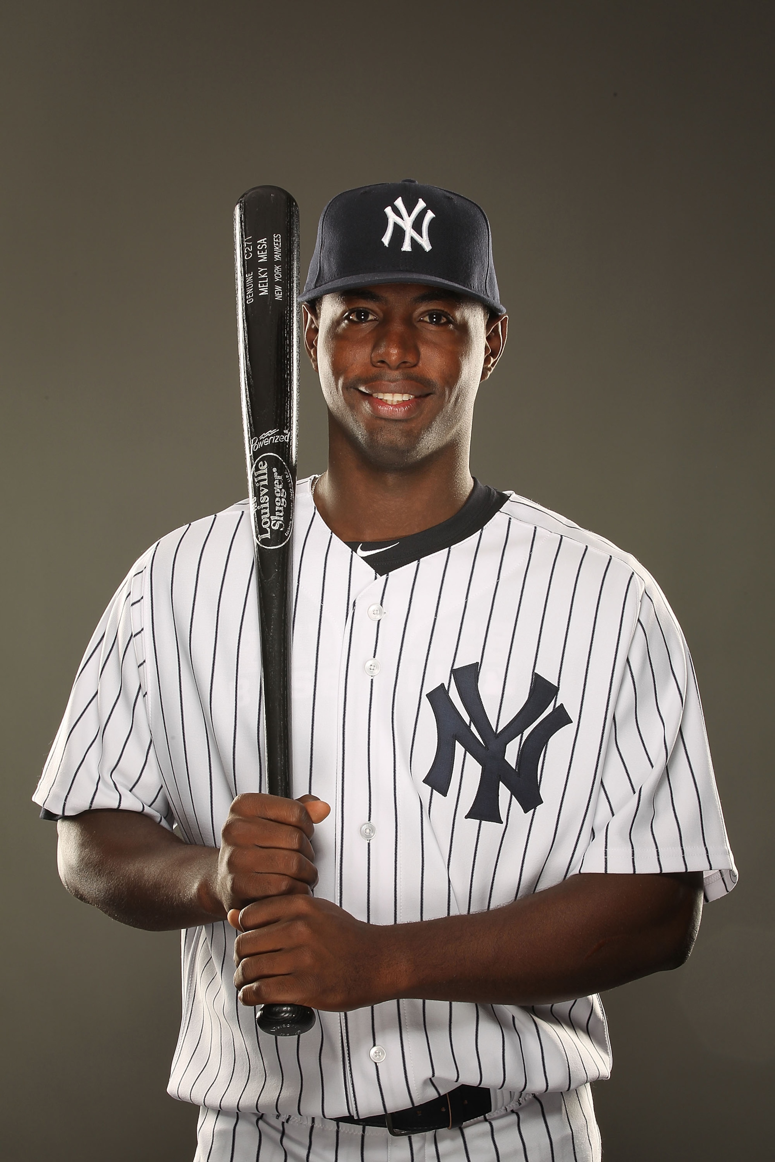 TAMPA, FL - FEBRUARY 23:  Melky Mesa #77 of the New York Yankees poses for a portrait on Photo Day at George M. Steinbrenner Field on February 23, 2011 in Tampa, Florida.  (Photo by Al Bello/Getty Images)