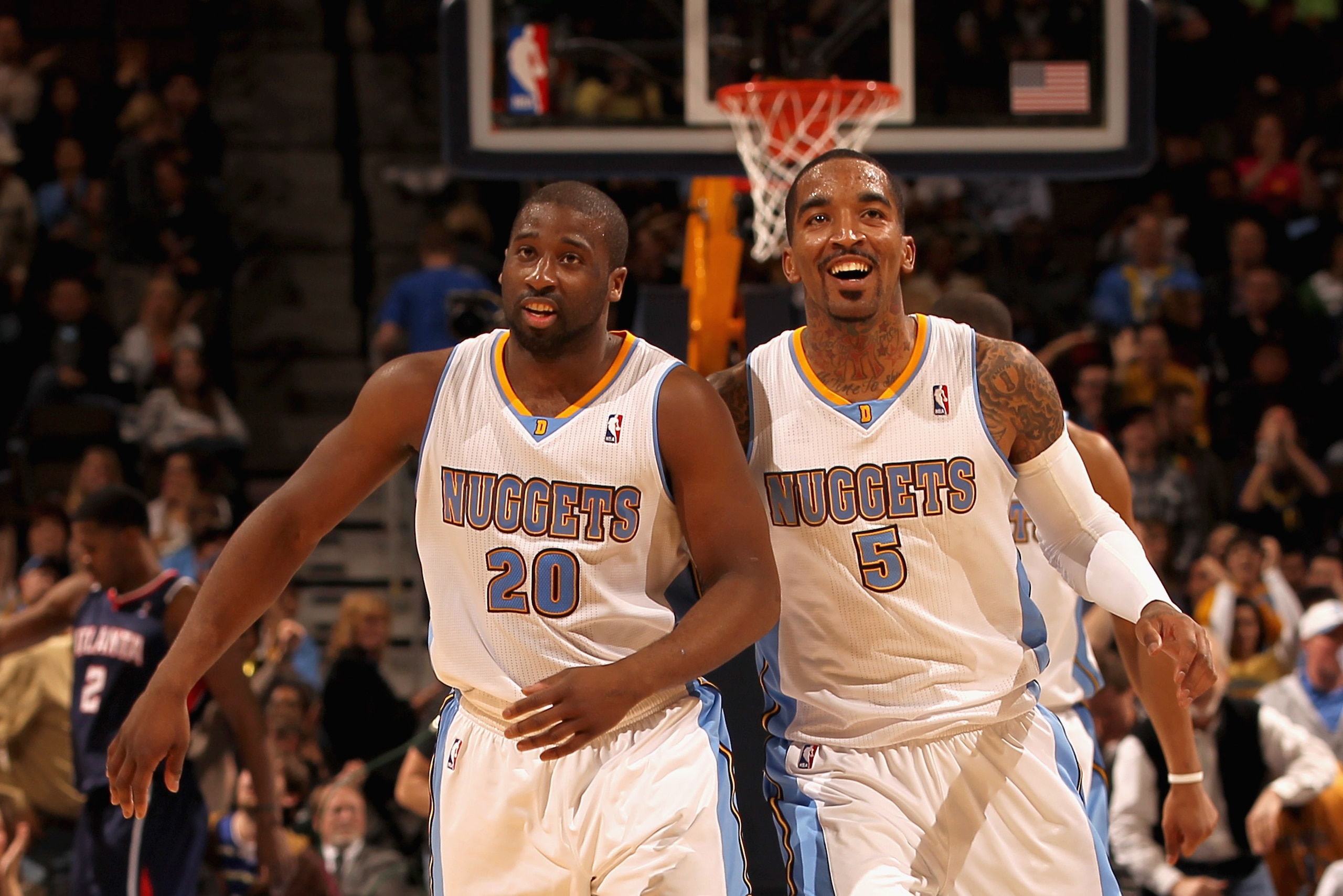 DENVER, CO - FEBRUARY 28:  Raymond Felton #20 and J.R. Smith #5 of the Denver Nuggets celebrate after connecting to score against the Atlanta Hawks during NBA action at the Pepsi Center on February 28, 2011 in Denver, Colorado. The Nuggets deafeated the H
