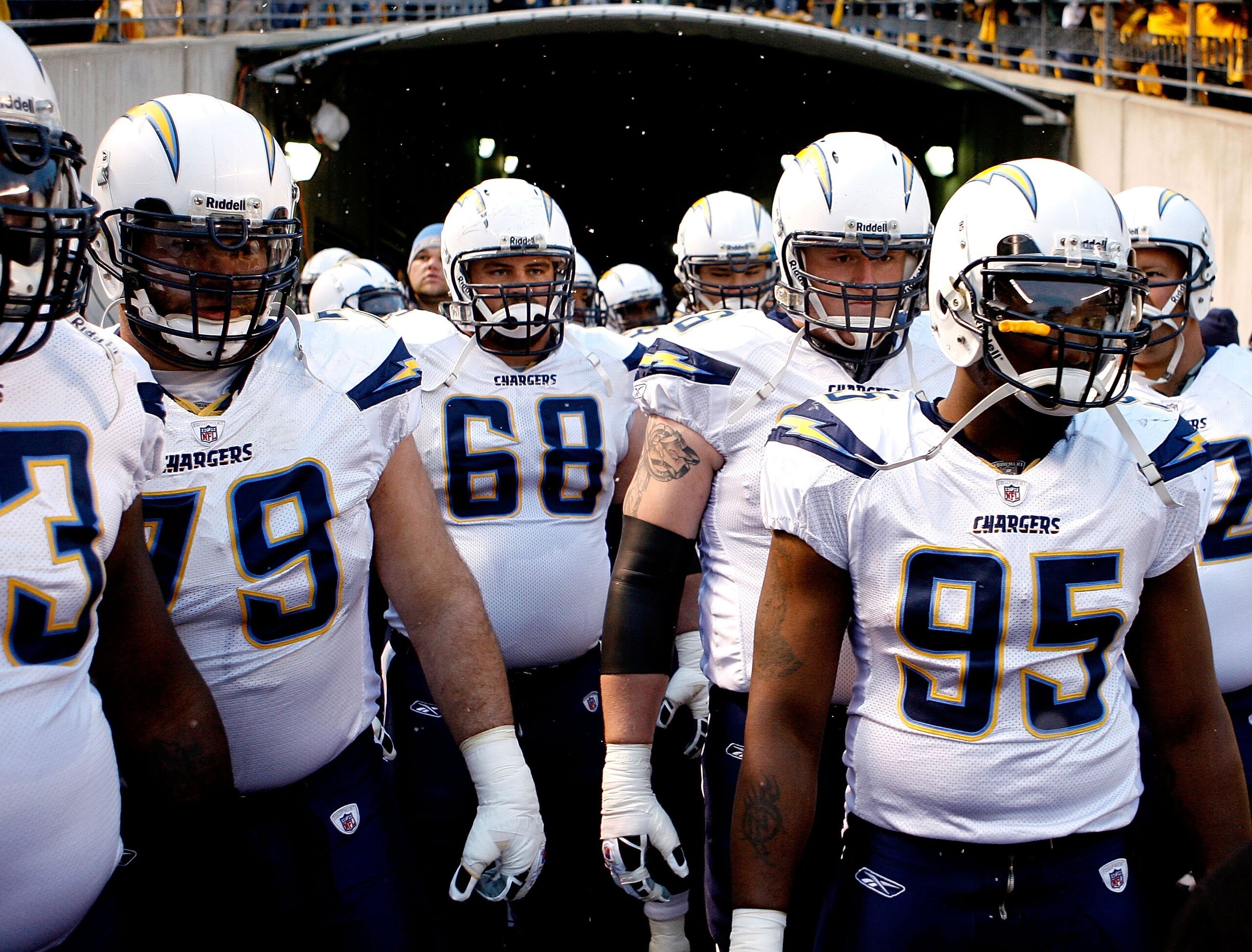 PITTSBURGH - JANUARY 11:  Mike Goff #79, Kris Dielman #68, Jeromey Clary #66 and Shaun Phillips #95 of the San Diego Chargers wait in the tunnel before taking the field against the Pittsburgh Steelers during their AFC Divisional Playoff Game on January 11