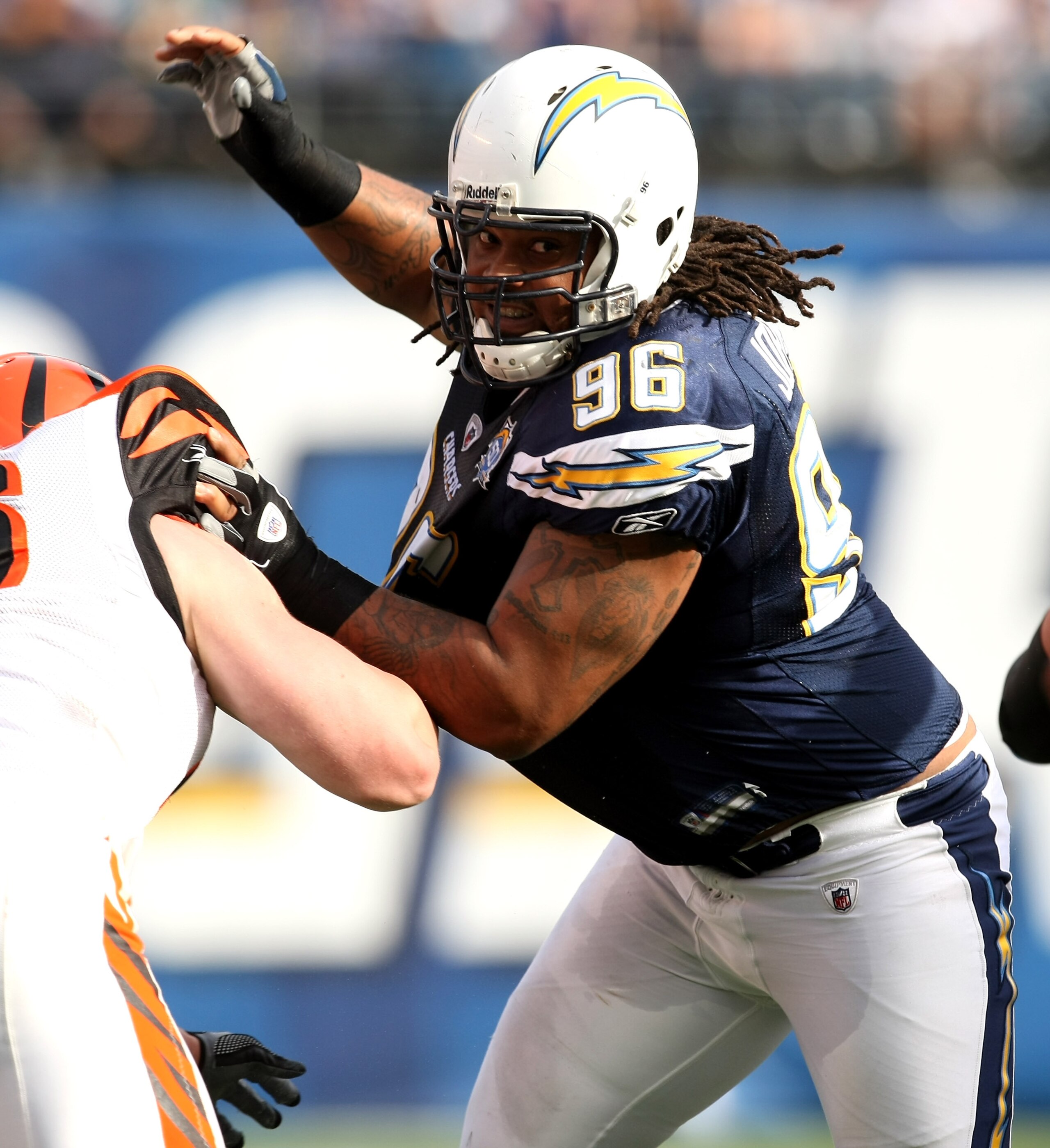 SAN DIEGO - DECEMBER 20: Defensive lineman Travis Johnson #96 of the San Diego Chargers battles at the line against the Cincinnati Bengals on December 20, 2009 at Qualcomm Stadium in San Diego, California.    (Photo by Stephen Dunn/Getty Images)