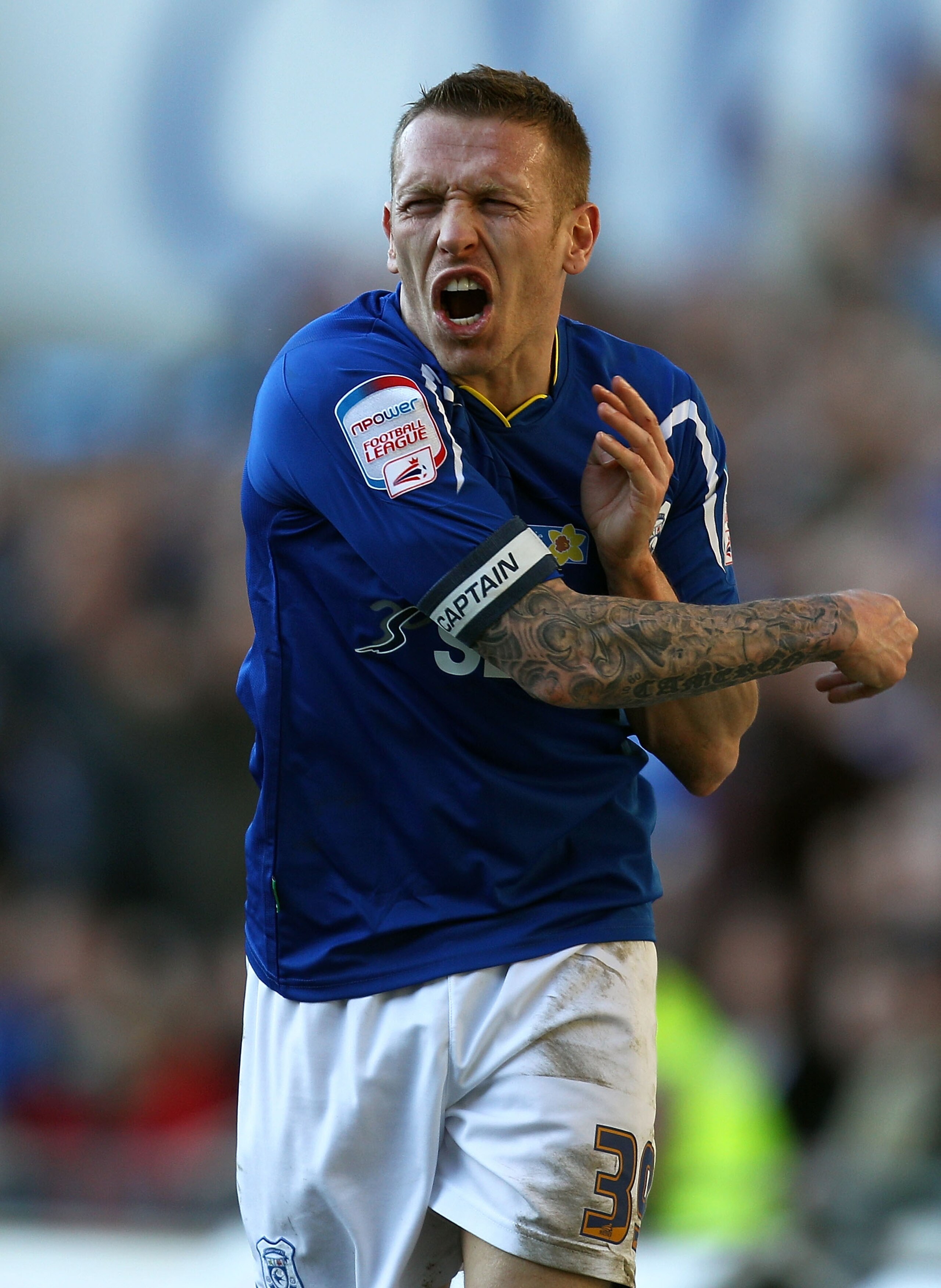 CARDIFF, WALES - MARCH 13:  Craig Bellamy of Cardiff City shows his frustration and throws the ball away during the npower Championship match between Cardiff City and Barnsley at Cardiff City Stadium on March 13, 2011 in Cardiff, Wales.  (Photo by Paul Gi