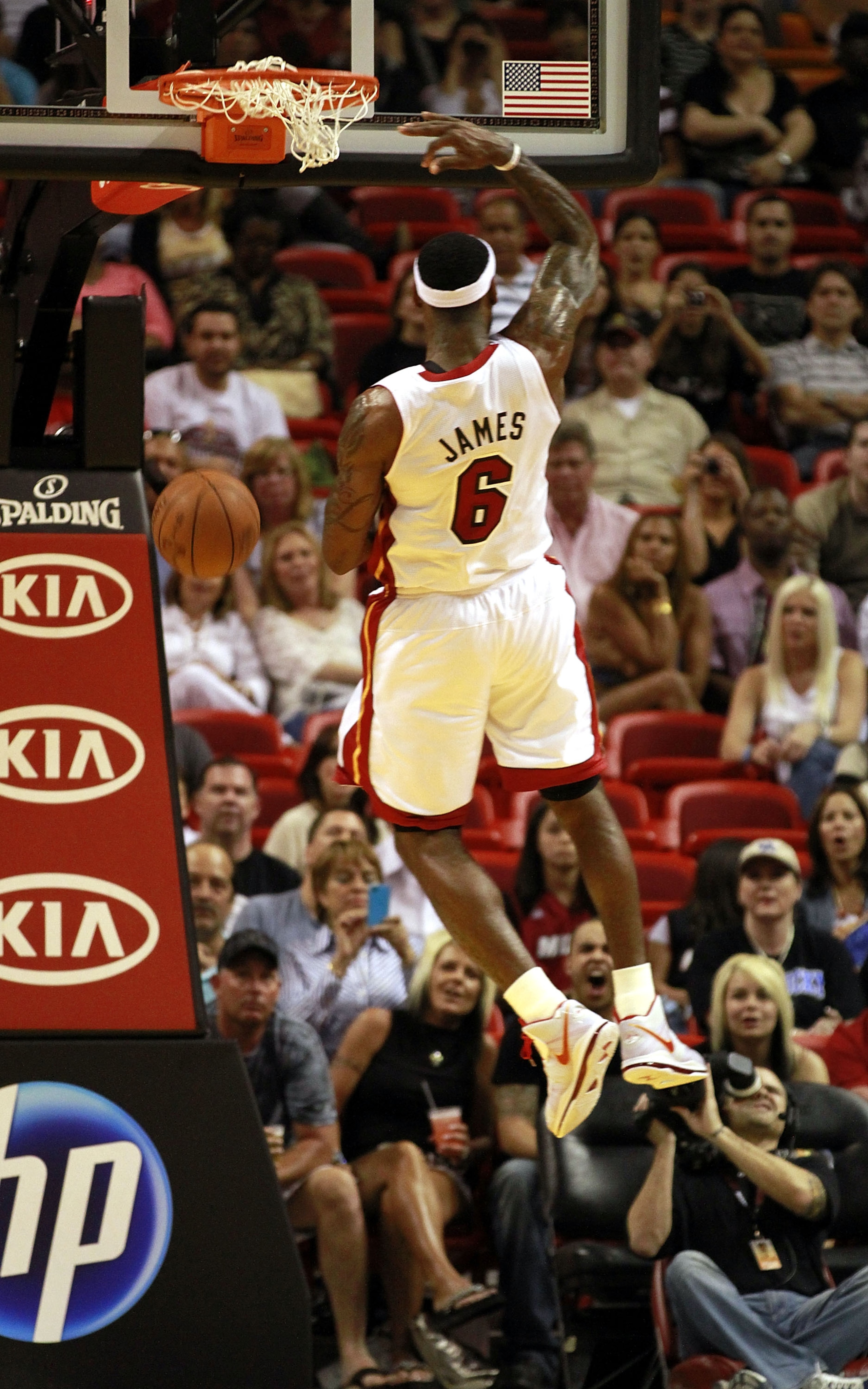 MIAMI, FL - MARCH 19:  Forward LeBron James #6 of the Miami Heat dunks against the Denver Nuggets at American Airlines Arena on March 19, 2011 in Miami, Florida. The Heat defeated the Nuggets 103-98. NOTE TO USER: User expressly acknowledges and agrees th