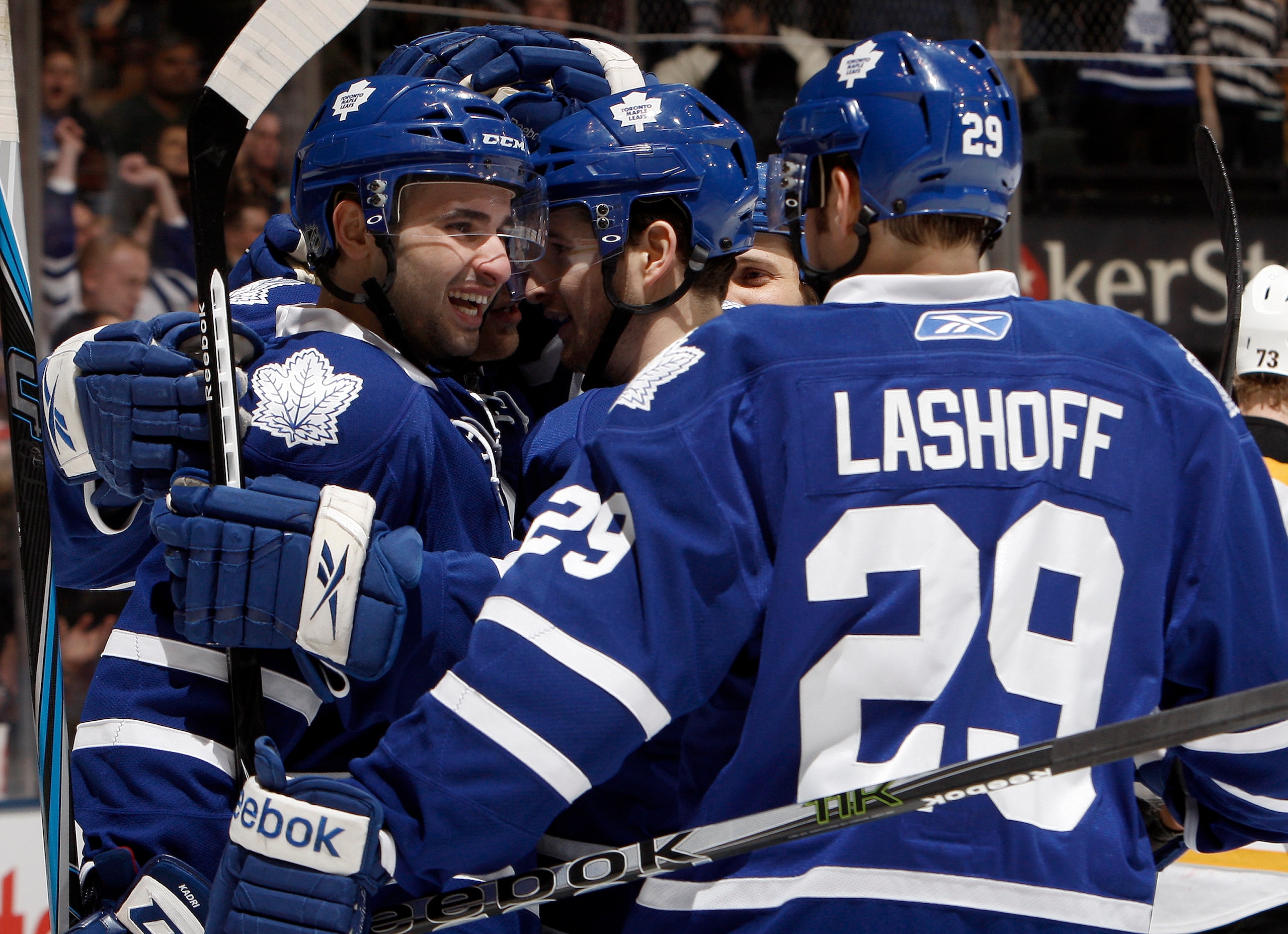 TORONTO, CANADA - MARCH 19  Nazem Kadri #43, Darryl Boyce #47 and Matt Lashoff #29 of the Toronto Maple Leafs celebrate Joey Crabb goal against the Boston Bruins during game action at the Air Canada Centre March 19, 2011 in Toronto, Ontario, Canada. (Phot