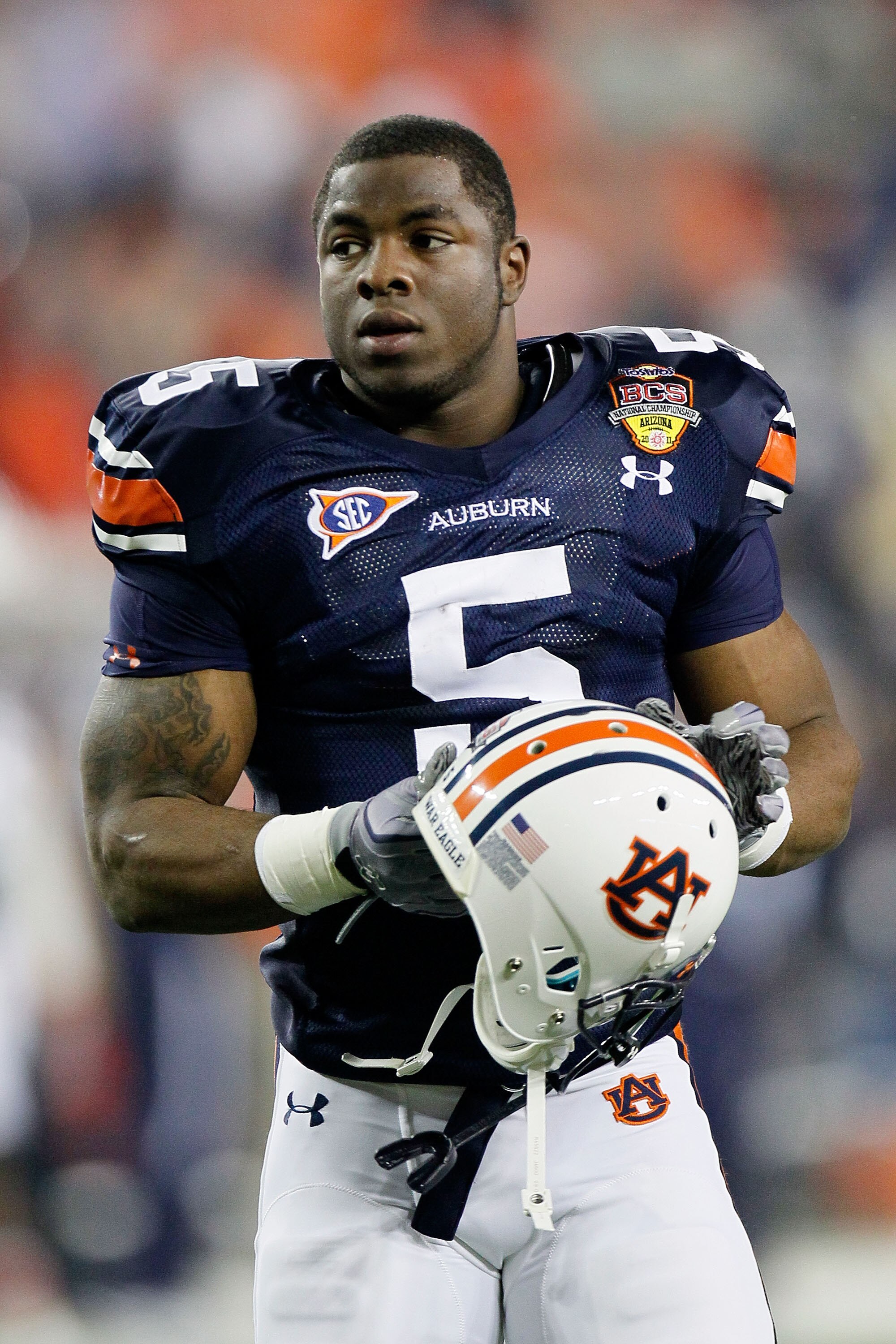 GLENDALE, AZ - JANUARY 10:  Michael Dyer #5 of the Auburn Tigers looks on against the Oregon Ducks during the Tostitos BCS National Championship Game at University of Phoenix Stadium on January 10, 2011 in Glendale, Arizona.  (Photo by Kevin C. Cox/Getty