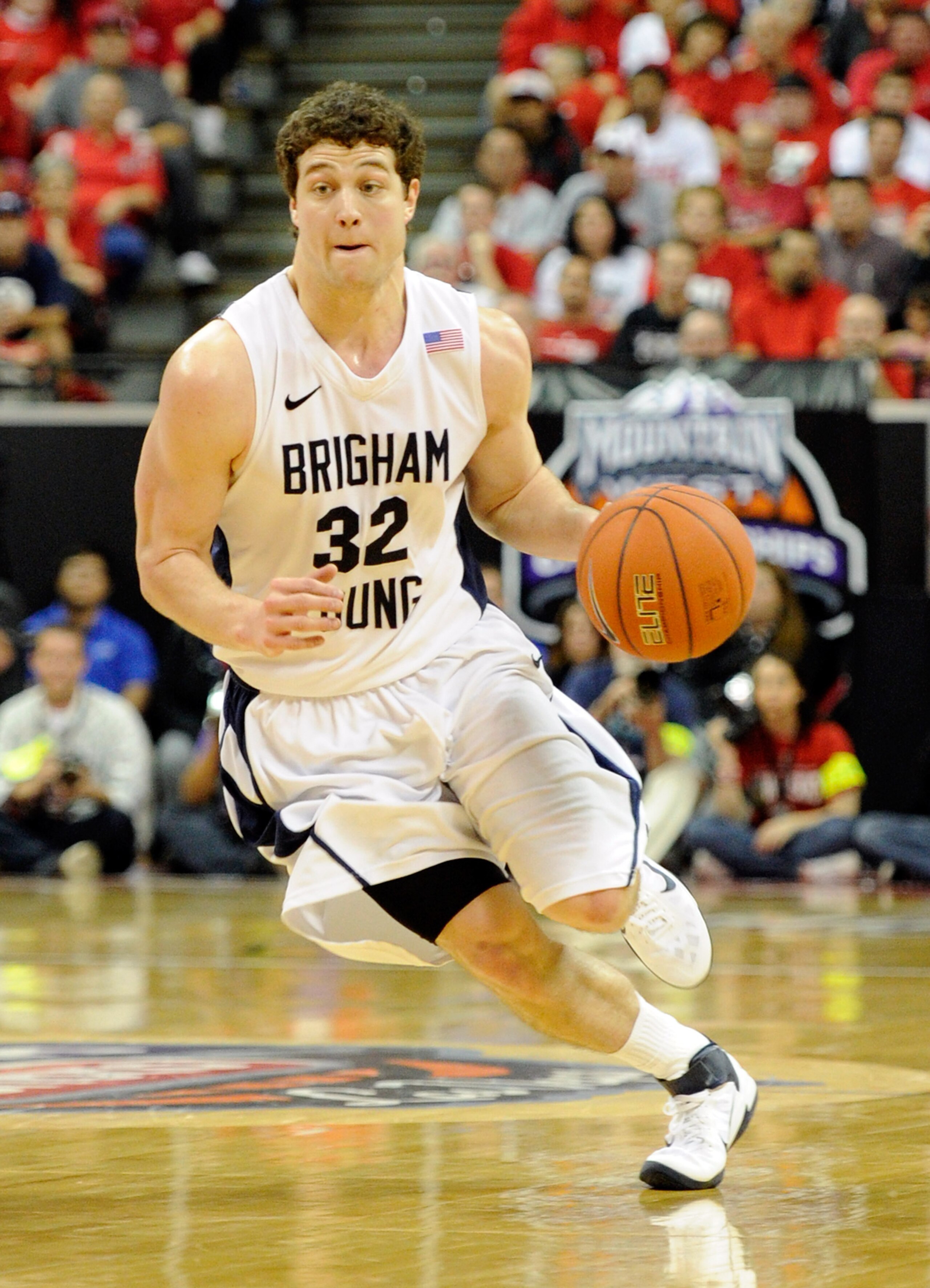 LAS VEGAS, NV - MARCH 11: Jimmer Fredette #32 of the Brigham Young University Cougars brings the ball up the court during a semifinal game of the Conoco Mountain West Conference Basketball tournament against the New Mexico Lobos at the Thomas & Mack Cent LAS VEGAS, NV - MARCH 11: Jimmer Fredette #32 of the Brigham Young University Cougars brings the ball up the court during a semifinal game of the Conoco Mountain West Conference Basketball tournament against the New Mexico Lobos at the Thomas & Mack Cent
