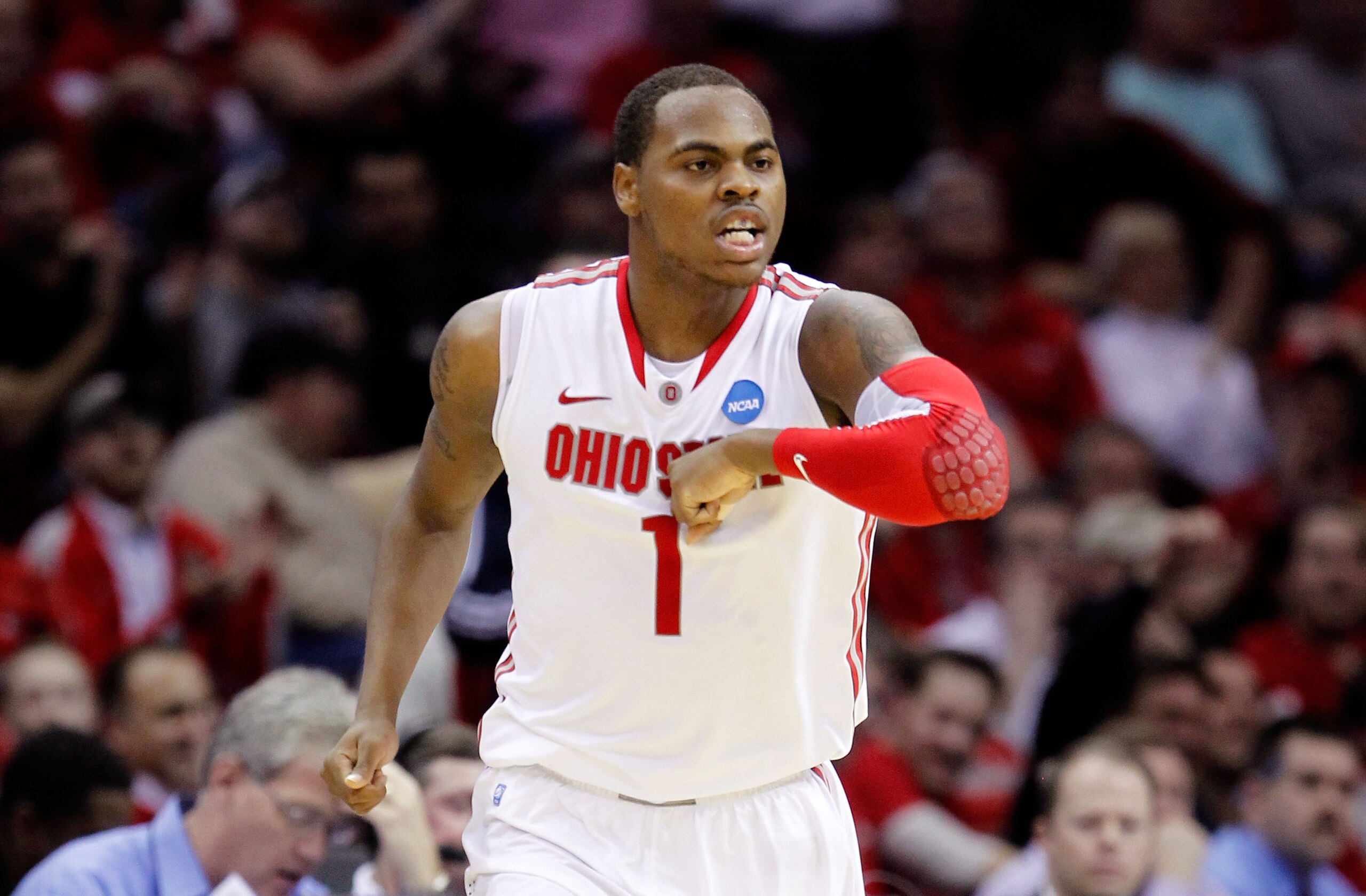 CLEVELAND, OH - MARCH 18: Deshaun Thomas #1 of the Ohio State Buckeyes celebrates after a play in the second half against the Texas-San Antonio Roadrunners during the second round of the 2011 NCAA men's basketball tournament at Quicken Loans Arena on Marc