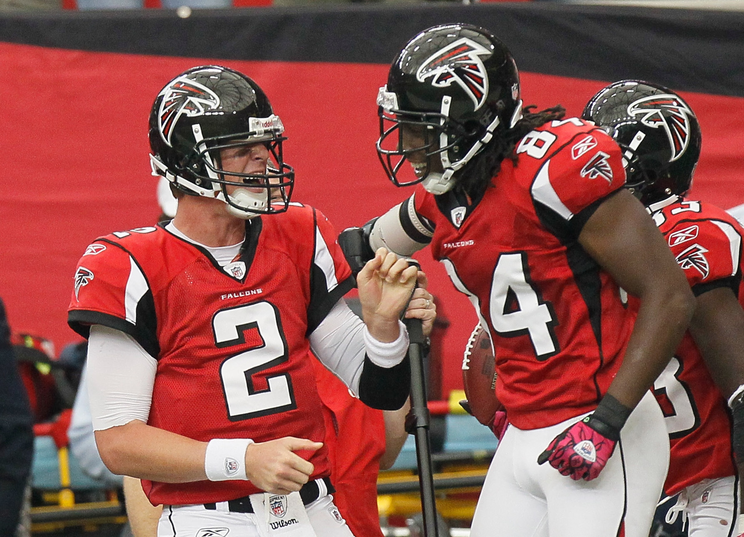 ATLANTA - OCTOBER 24:  Roddy White #84 of the Atlanta Falcons celebrates after pulling a touchdown reception from quarterback Matt Ryan against the Cincinnati Bengals at Georgia Dome on October 24, 2010 in Atlanta, Georgia.  (Photo by Kevin C. Cox/Getty I