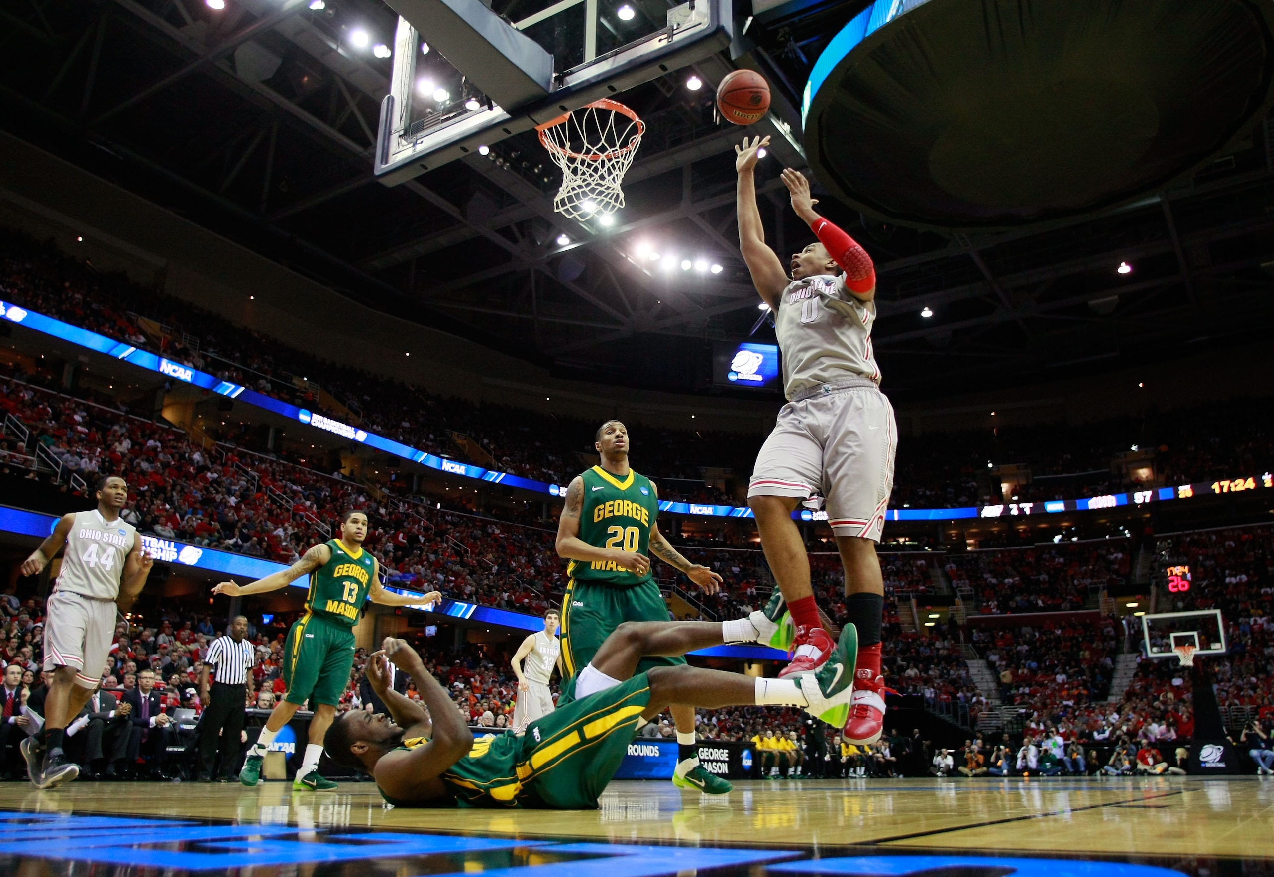 CLEVELAND, OH - MARCH 20: Jared Sullinger #0 of the Ohio State Buckeyes drives to the basket against the George Mason Patriots during the third of the 2011 NCAA men's basketball tournament at Quicken Loans Arena on March 20, 2011 in Cleveland, Ohio. (Pho CLEVELAND, OH - MARCH 20: Jared Sullinger #0 of the Ohio State Buckeyes drives to the basket against the George Mason Patriots during the third of the 2011 NCAA men's basketball tournament at Quicken Loans Arena on March 20, 2011 in Cleveland, Ohio. (Pho