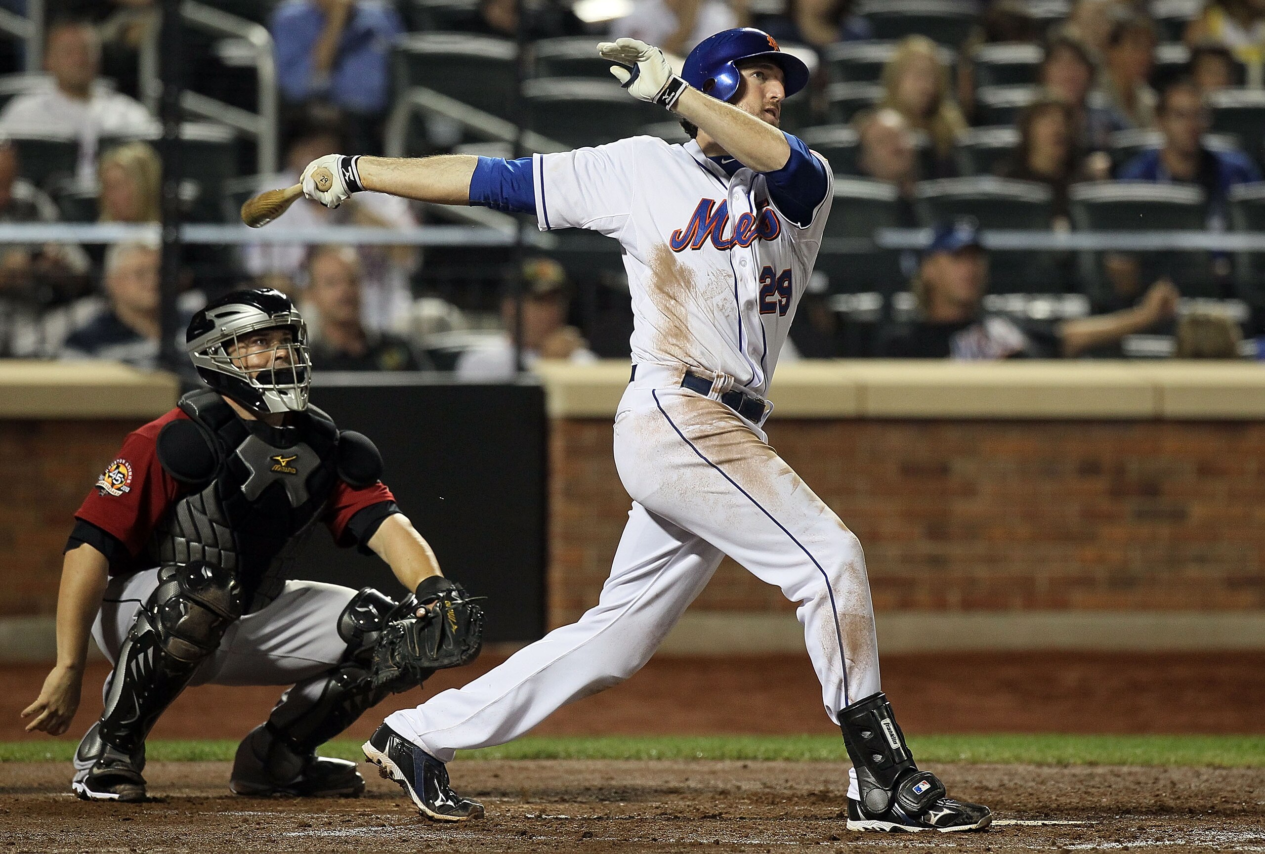 NEW YORK - AUGUST 28:  Ike Davis #29 of the New York Mets doubles in the fourth inning against the Houston Astros on August 28, 2010 at Citi Field in the Flushing neighborhood of the Queens borough of New York City.  (Photo by Jim McIsaac/Getty Images)