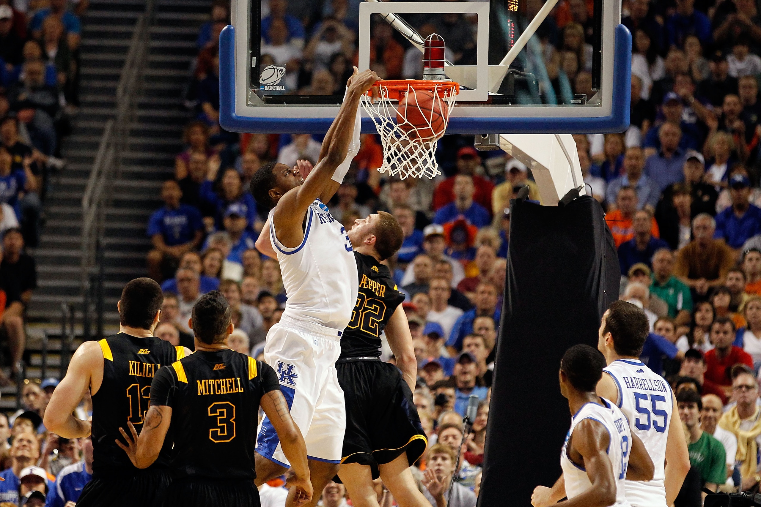 TAMPA, FL - MARCH 19:  Terrence Jones #3 of the Kentucky Wildcats dunks against Dalton Pepper #32 of the West Virginia Mountaineers during the third round of the 2011 NCAA men's basketball tournament at St. Pete Times Forum on March 19, 2011 in Tampa, Flo