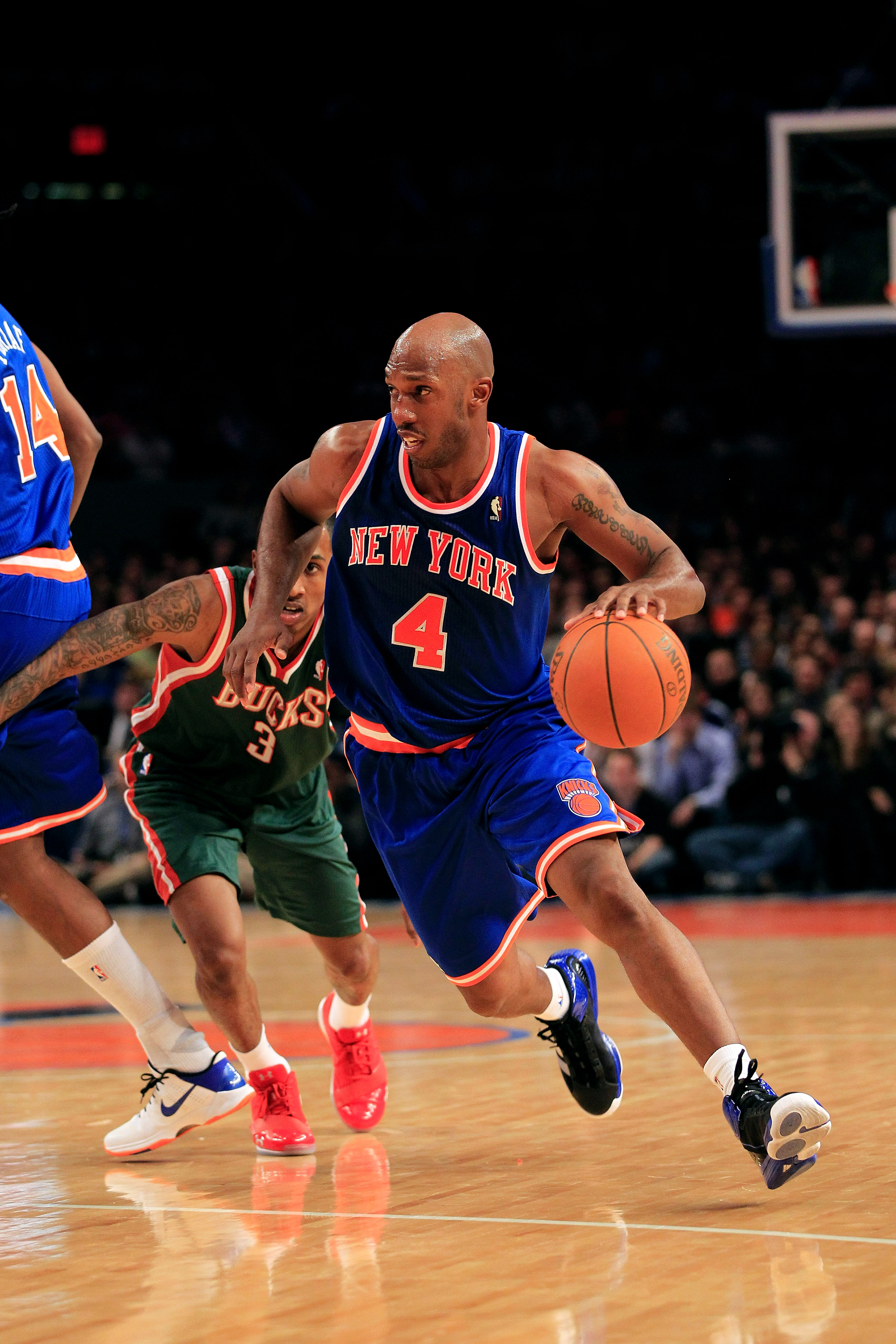 NEW YORK, NY - FEBRUARY 23:  Chauncey Billups #4 of the New York Knicks dribbles the ball past  Corey Maggette of the Milwaukee Bucks at Madison Square Garden on February 23, 2011 in New York City. NOTE TO USER: User expressly acknowledges and agrees that