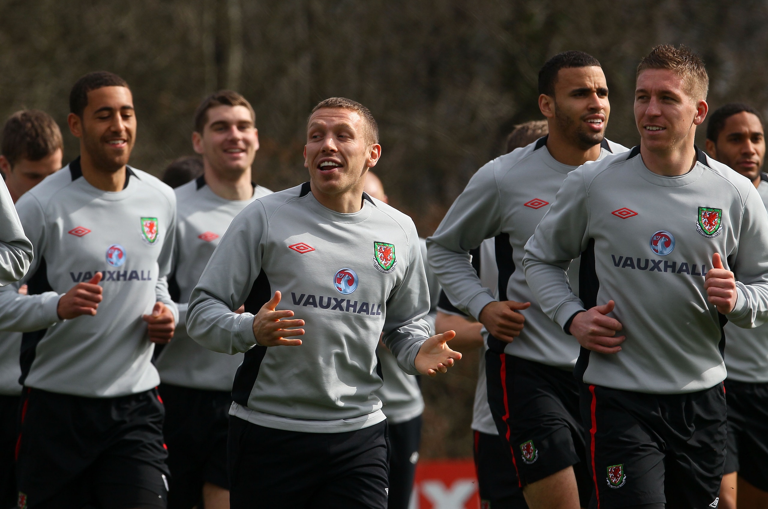 CARDIFF, WALES - MARCH 22:  Wales striker Craig Bellamy (c) shares a joke with team mates during Wales training at the Vale ahead of their UEFA EURO 2012 qualifier against England, on March 22, 2011 in Cardiff, Wales.  (Photo by Stu Forster/Getty Images)