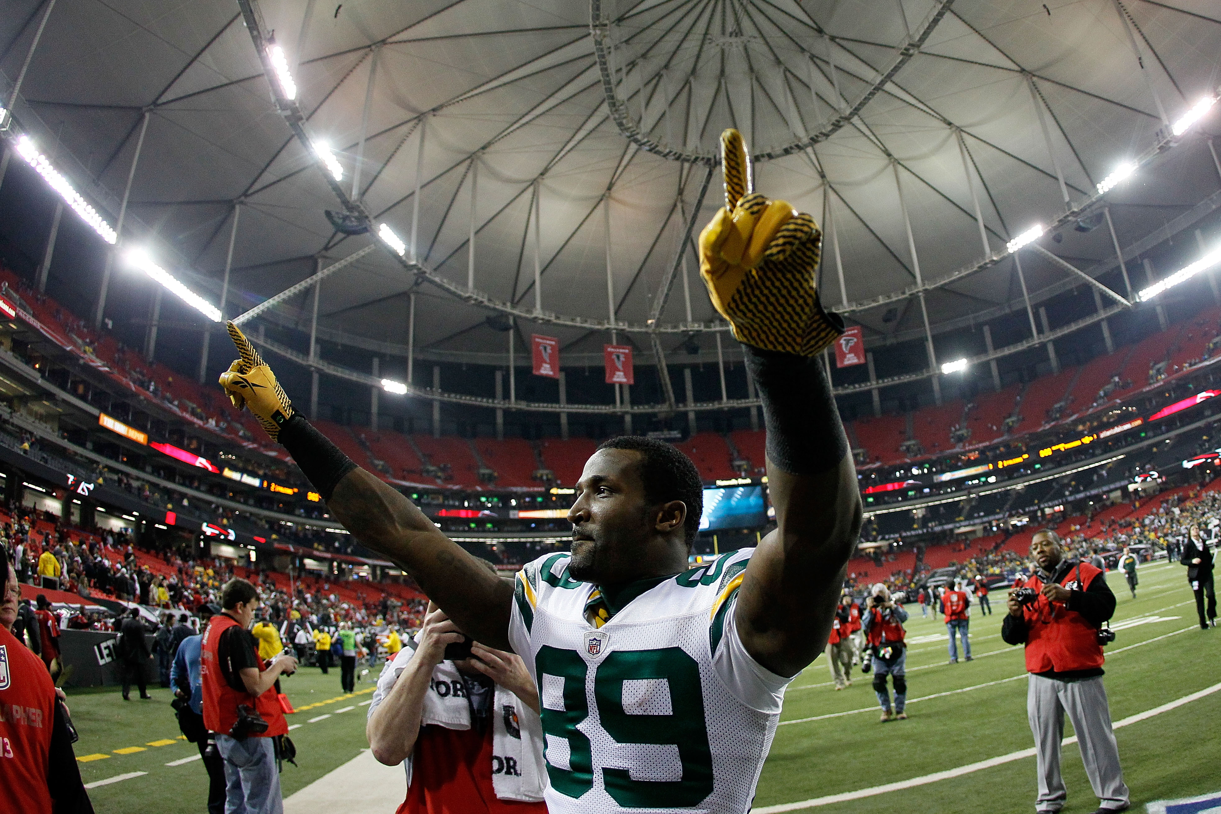 ATLANTA, GA - JANUARY 15:  James Jones #89 of the Green Bay Packers celebrates as he walks off the field after the Pakers won 48-21 against the Atlanta Falcons during their 2011 NFC divisional playoff game at Georgia Dome on January 15, 2011 in Atlanta, G