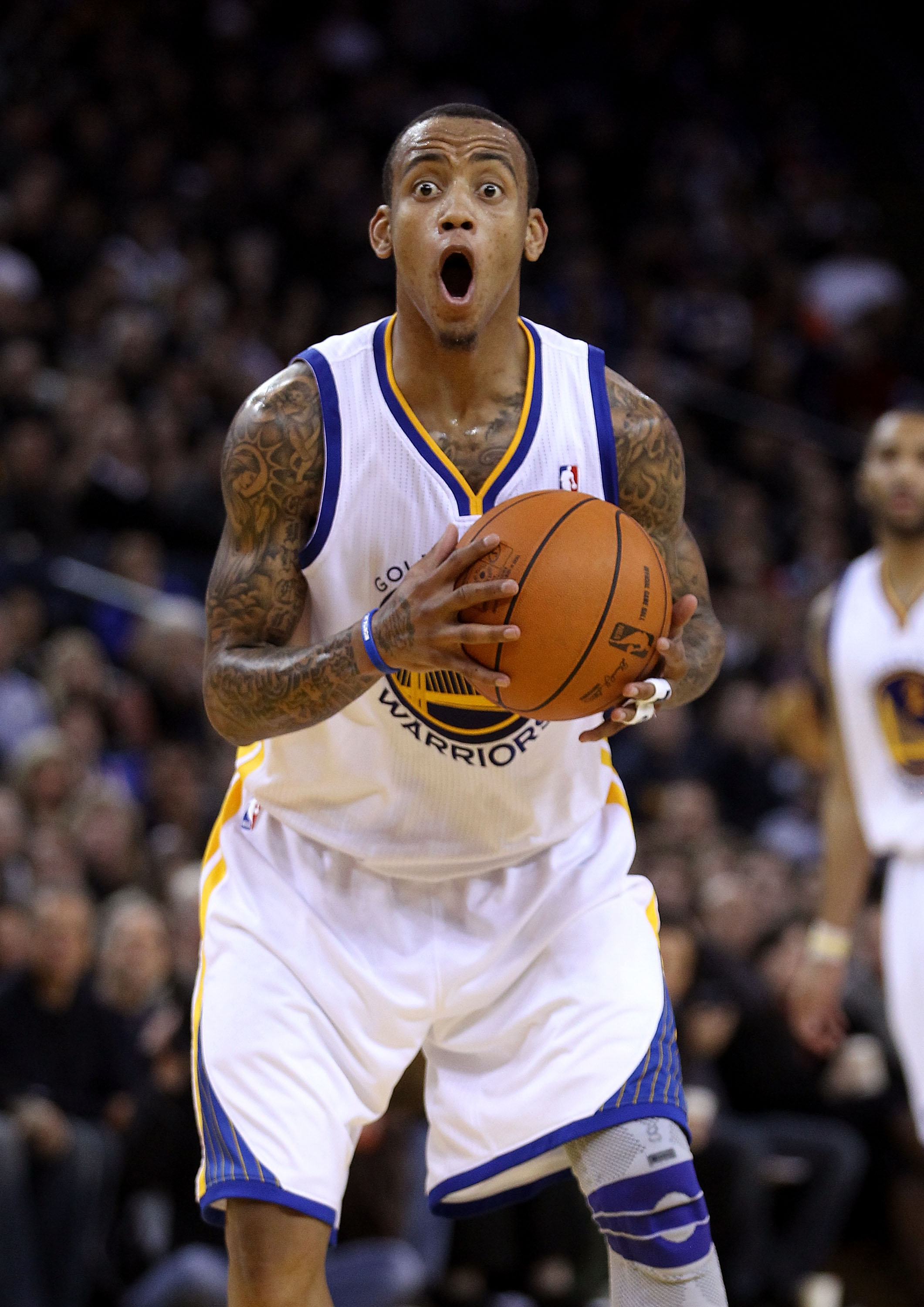 OAKLAND, CA - DECEMBER 20:  Monta Ellis #8 of the Golden State Warriors reacts after being called for an offensive foul against the Houston Rockets at Oracle Arena on December 20, 2010 in Oakland, California. NOTE TO USER: User expressly acknowledges and