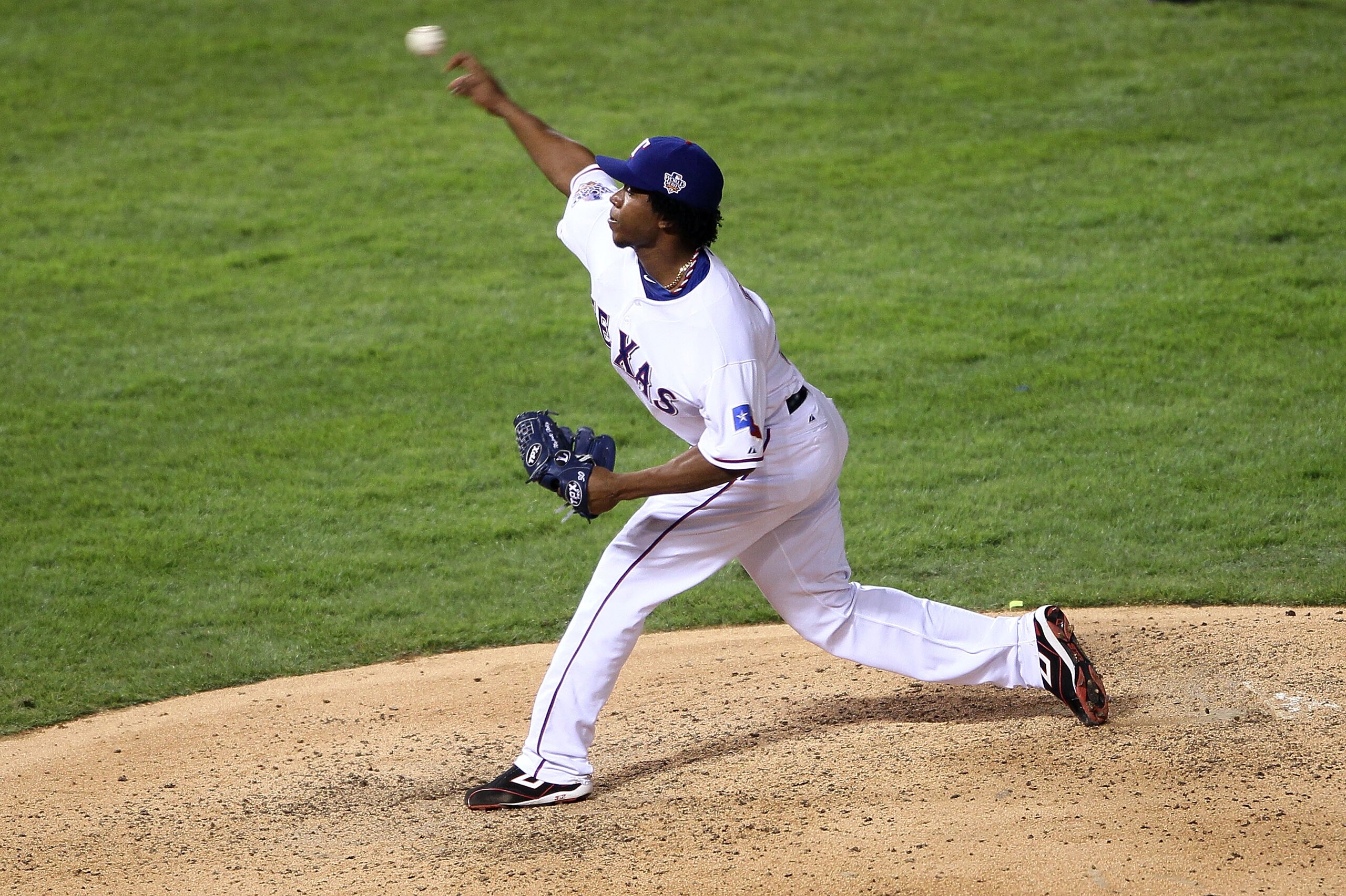 ARLINGTON, TX - NOVEMBER 01:  Neftali Feliz #30 of the Texas Rangers pitches against the San Francisco Giants in Game Five of the 2010 MLB World Series at Rangers Ballpark in Arlington on November 1, 2010 in Arlington, Texas. The Giants won 3-1. (Photo by