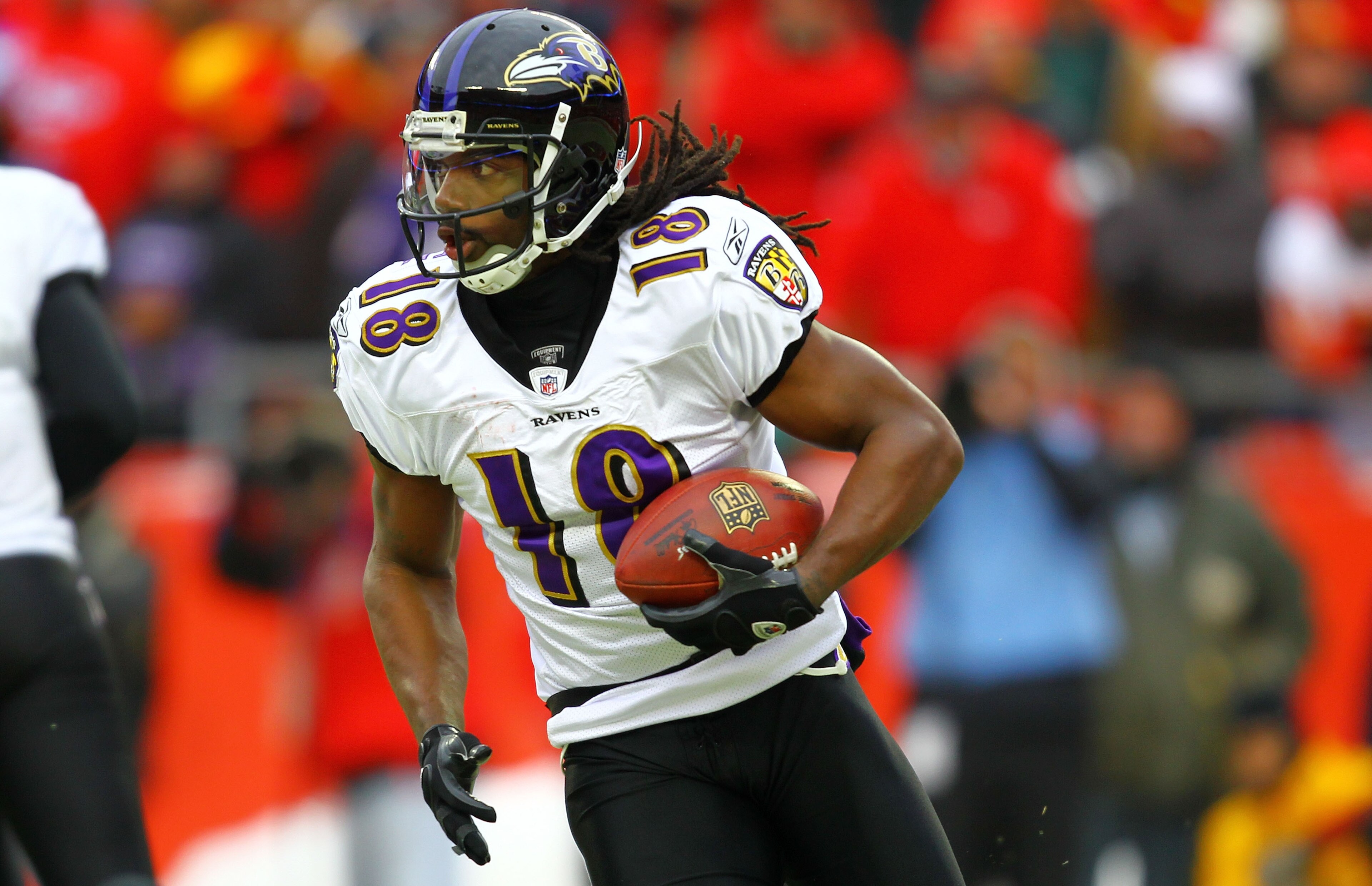 KANSAS CITY, MO - JANUARY 09: Wide receiver Donte' Stallworth #18 of the Baltimore Ravens runs with the ball on a reverse against the Kansas City Chiefs during their 2011 AFC wild card playoff game at Arrowhead Stadium on January 9, 2011 in Kansas City, KANSAS CITY, MO - JANUARY 09: Wide receiver Donte' Stallworth #18 of the Baltimore Ravens runs with the ball on a reverse against the Kansas City Chiefs during their 2011 AFC wild card playoff game at Arrowhead Stadium on January 9, 2011 in Kansas City,