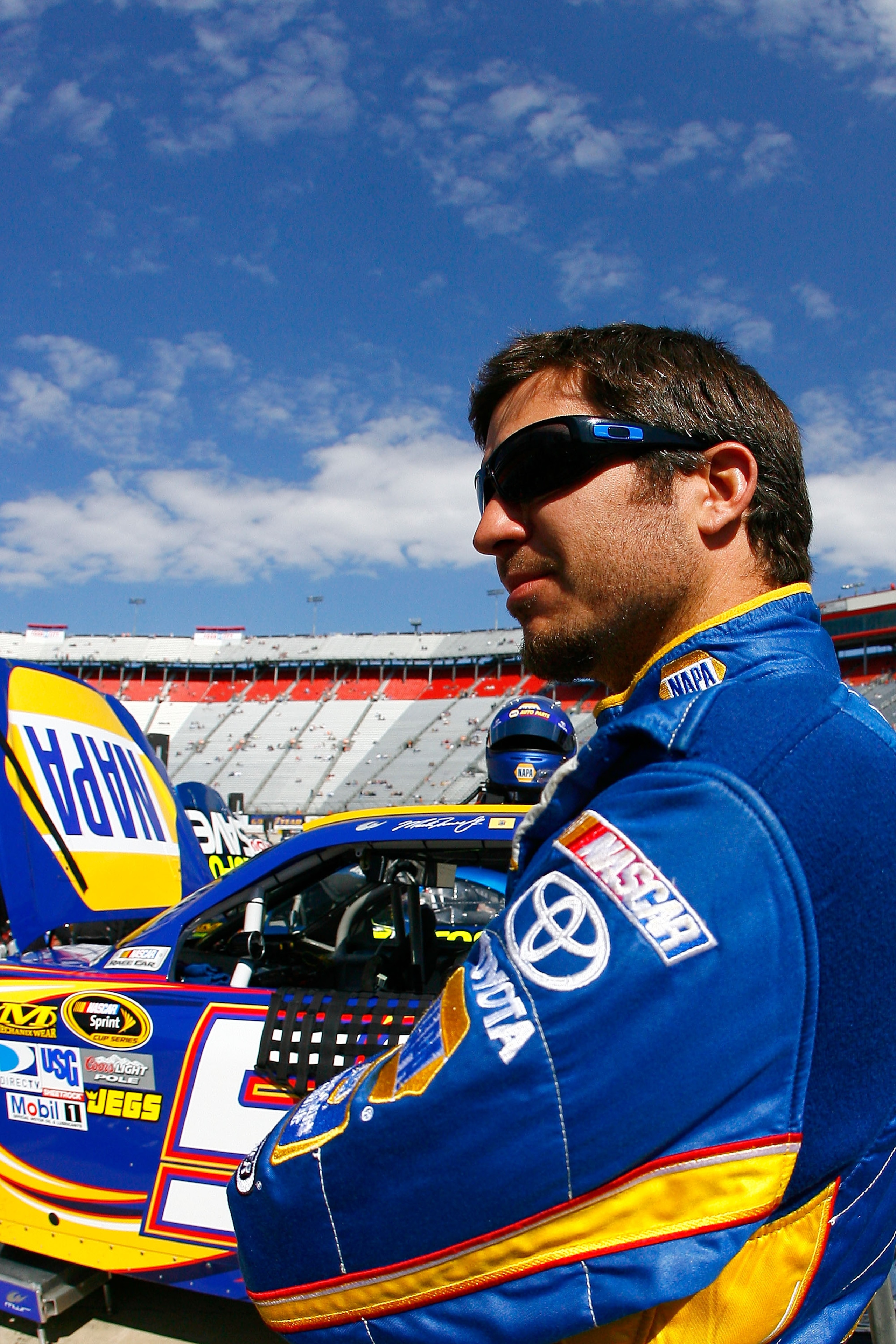 BRISTOL, TN - MARCH 19: Martin Truex Jr., stands beside the #56 NAPA Toyota, during practice for the NASCAR Sprint Cup Series Jeff Byrd 500 Presented By Food City at Bristol Motor Speedway on March 19, 2011 in Bristol, Tennessee. (Photo by Jason Smith/G BRISTOL, TN - MARCH 19: Martin Truex Jr., stands beside the #56 NAPA Toyota, during practice for the NASCAR Sprint Cup Series Jeff Byrd 500 Presented By Food City at Bristol Motor Speedway on March 19, 2011 in Bristol, Tennessee. (Photo by Jason Smith/G