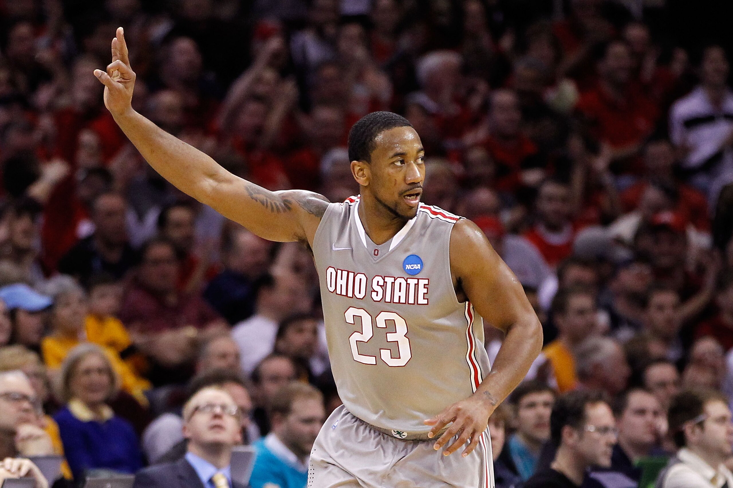 CLEVELAND, OH - MARCH 20: David Lighty #23 of the Ohio State Buckeyes gestures after making a three point basket against the George Mason Patriots during the third of the 2011 NCAA men's basketball tournament at Quicken Loans Arena on March 20, 2011 in Cl