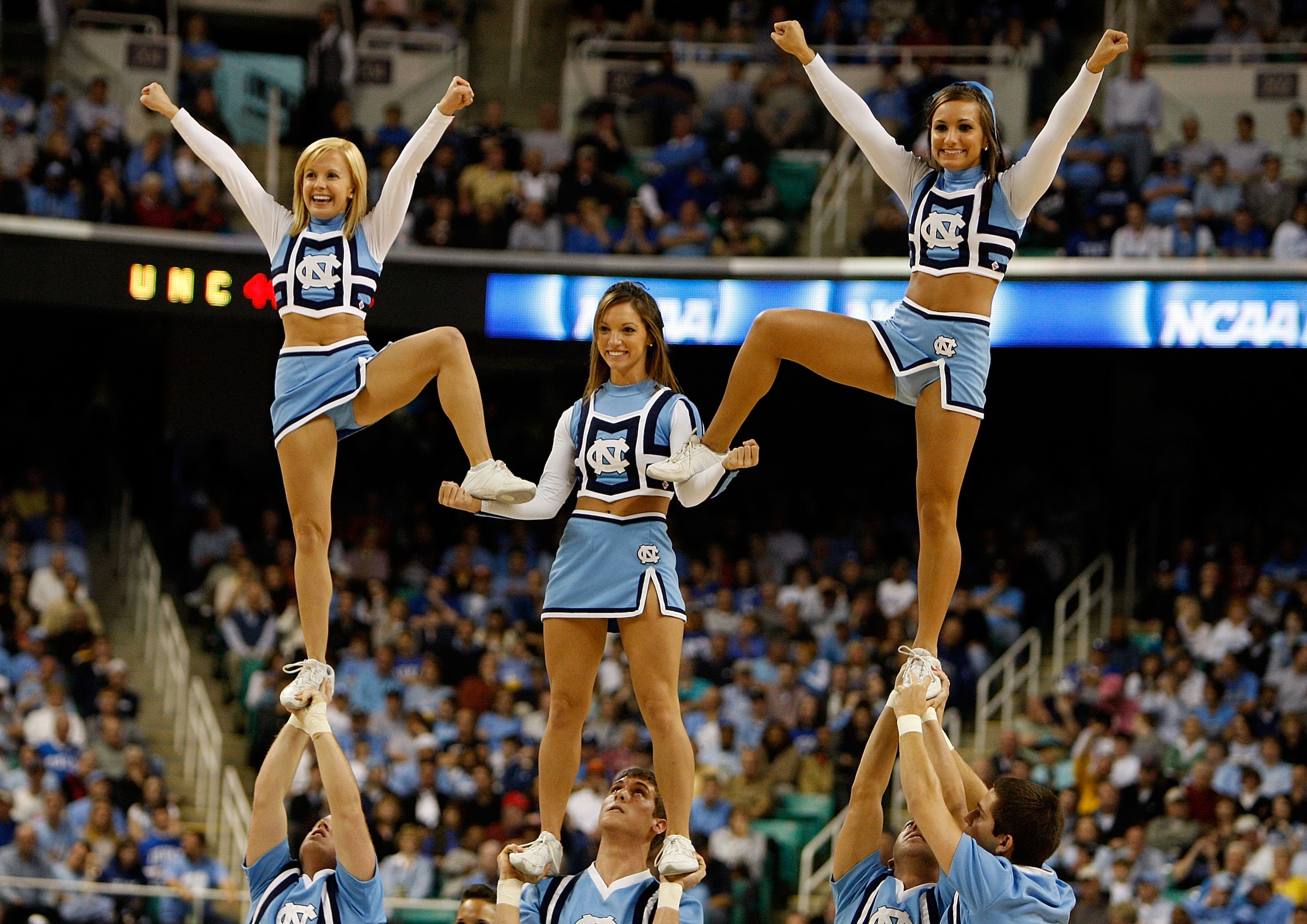 GREENSBORO, NC - MARCH 21:  The North Carolina Tar Heels cheerleaders perform during the second round of the NCAA Division I Men's Basketball Tournament against the Louisiana State University Tigers at the Greensboro Coliseum on March 21, 2009 in Greensbo