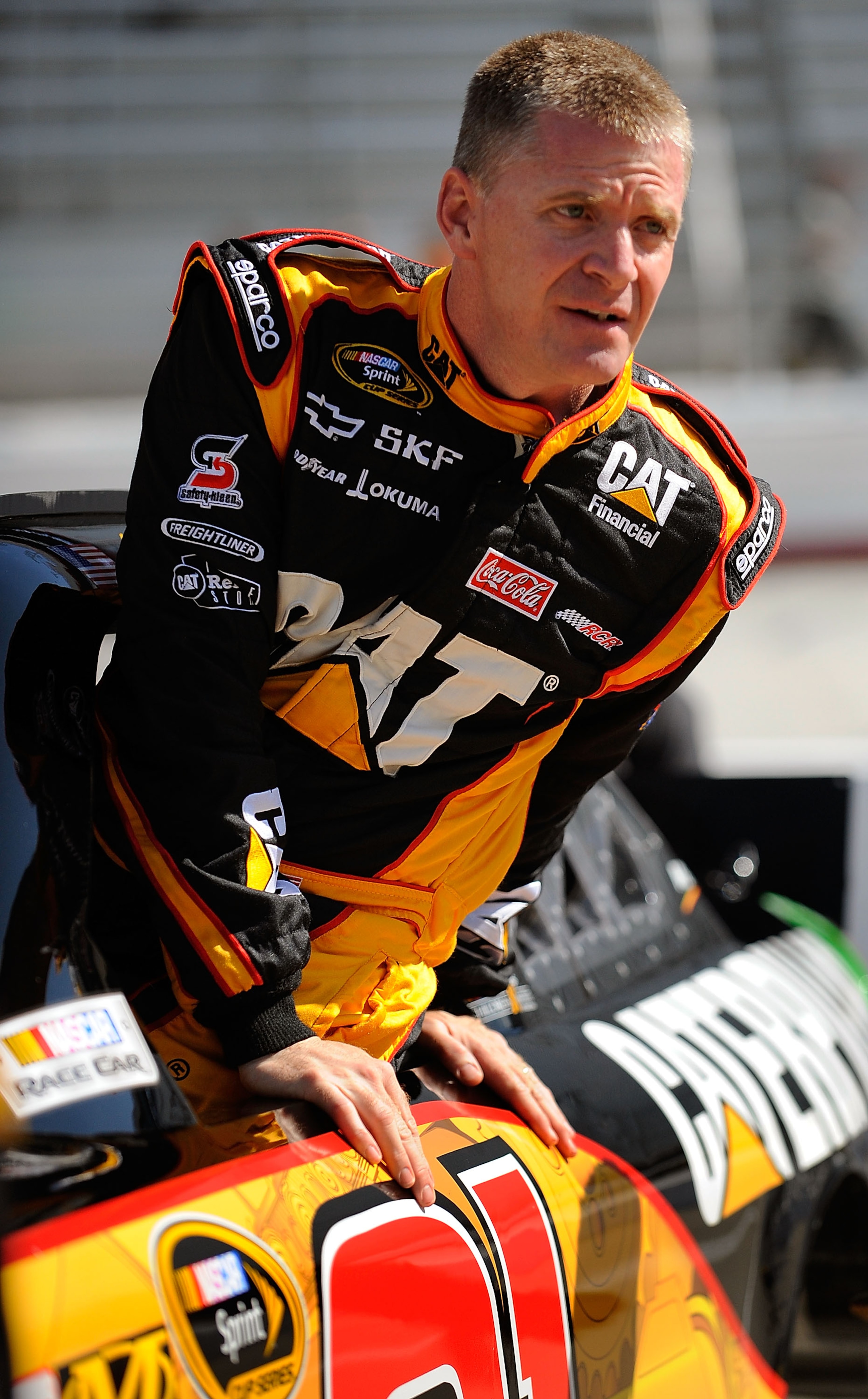 BRISTOL, TN - MARCH 19: Jeff Burton, driver of the #31 Caterpillar Chevrolet, climbs into his car prior to practice for the NASCAR Sprint Cup Series Jeff Byrd 500 Presented By Food City at Bristol Motor Speedway on March 19, 2011 in Bristol, Tennessee. BRISTOL, TN - MARCH 19: Jeff Burton, driver of the #31 Caterpillar Chevrolet, climbs into his car prior to practice for the NASCAR Sprint Cup Series Jeff Byrd 500 Presented By Food City at Bristol Motor Speedway on March 19, 2011 in Bristol, Tennessee.